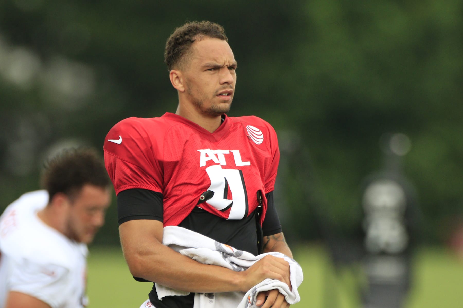 FLOWERY BRANCH, GA - AUGUST 04: Atlanta Falcons quarterback Desmond Ridder #9 stretches during Atlanta Falcons training camp on August 4, 2023 at IBM Performance Field in Flowery Branch, GA. (Photo by Jeff Robinson/Icon Sportswire via Getty Images)