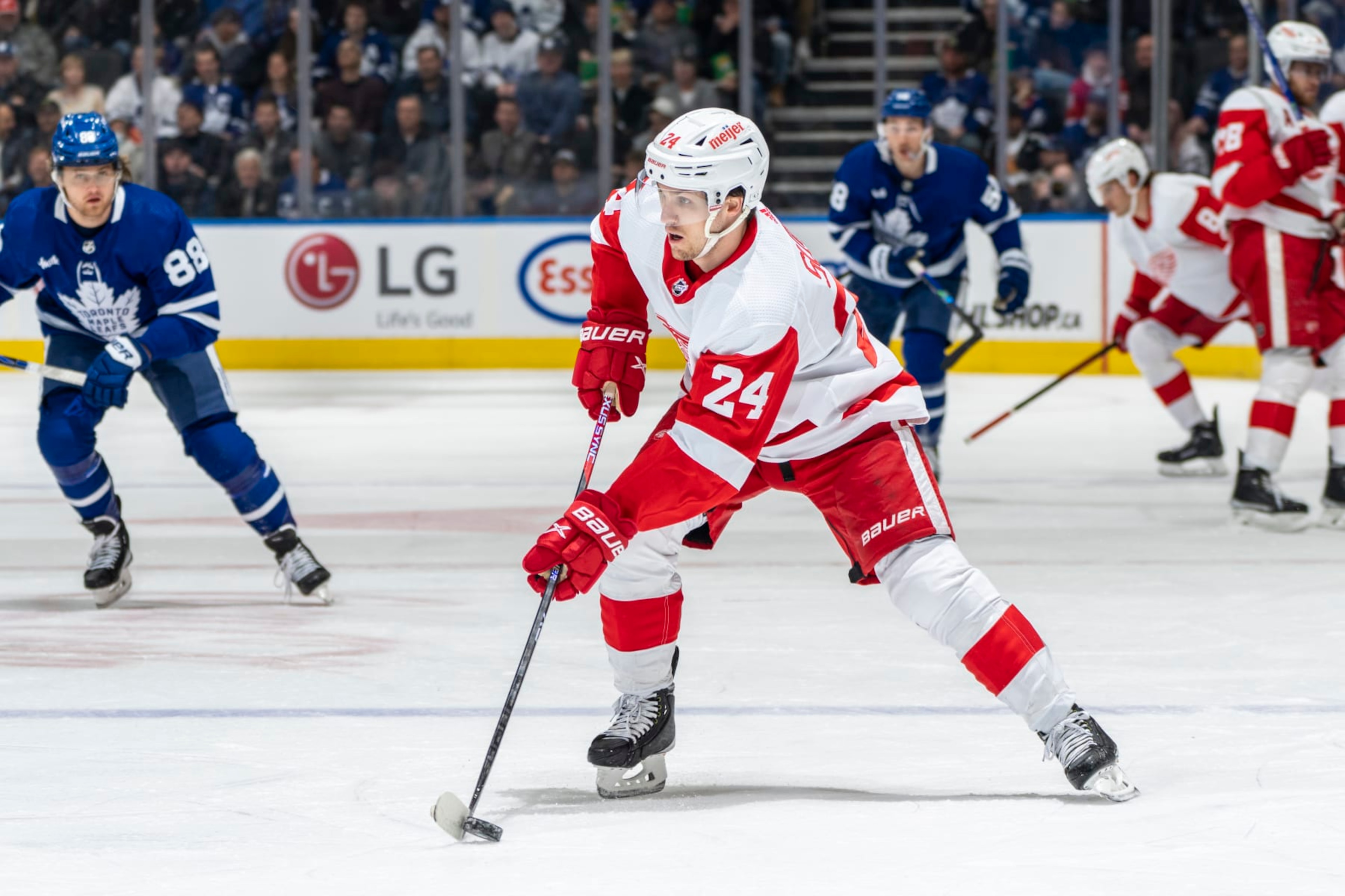 TORONTO, ON - APRIL 2: Pius Suter #24 of the Detroit Red Wings moves the puck against the Toronto Maple Leafs during the first period at the Scotiabank Arena on April 2, 2023 in Toronto, Ontario, Canada. (Photo by Kevin Sousa/NHLI via Getty Images) TORONTO, ON - APRIL 2: Pius Suter #24 of the Detroit Red Wings moves the puck against the Toronto Maple Leafs during the first period at the Scotiabank Arena on April 2, 2023 in Toronto, Ontario, Canada. (Photo by Kevin Sousa/NHLI via Getty Images)