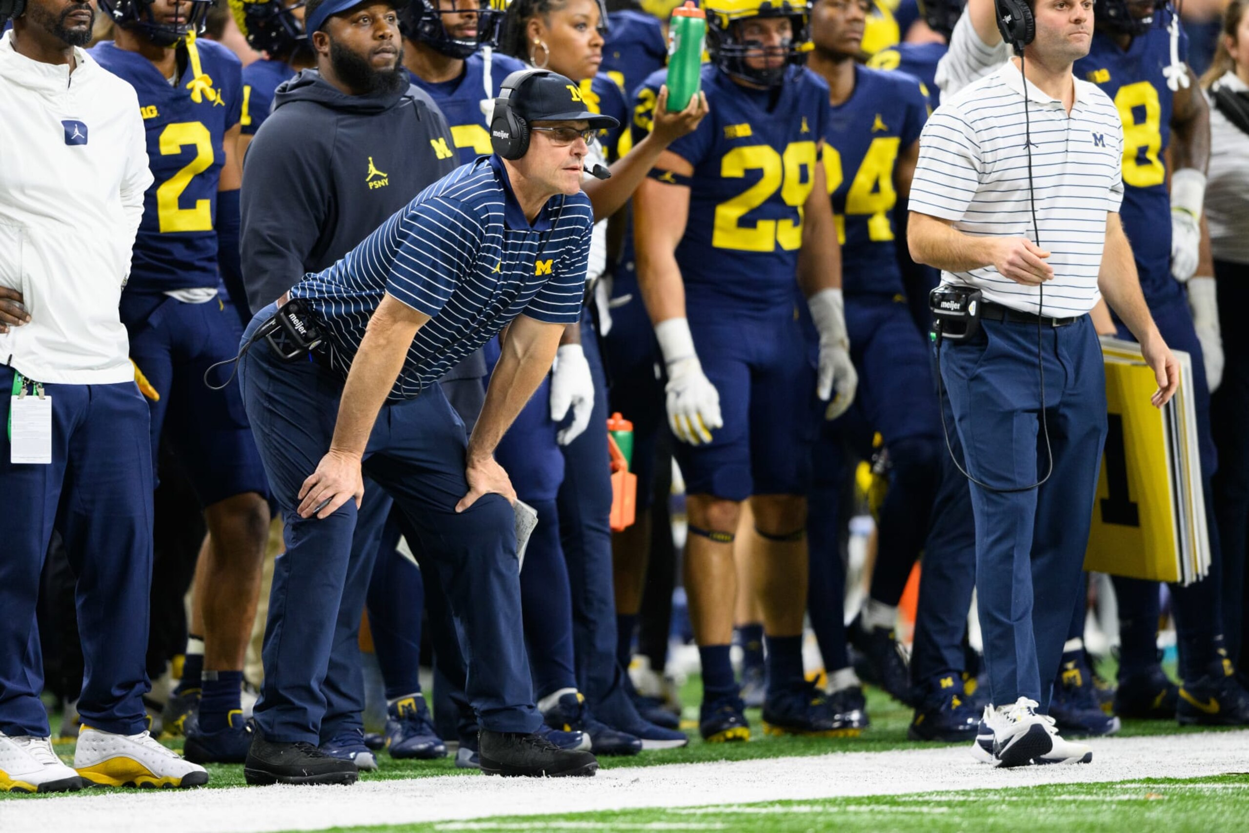 INDIANAPOLIS, IN - DECEMBER 03: Michigan Wolverines head coach Jim Harbaugh on the sidelines during the Big 10 Championship game between the Michigan Wolverines and Purdue Boilermakers on December 3, 2022, at Lucas Oil Stadium in Indianapolis, IN. (Photo by Zach Bolinger/Icon Sportswire via Getty Images) INDIANAPOLIS, IN - DECEMBER 03: Michigan Wolverines head coach Jim Harbaugh on the sidelines during the Big 10 Championship game between the Michigan Wolverines and Purdue Boilermakers on December 3, 2022, at Lucas Oil Stadium in Indianapolis, IN. (Photo by Zach Bolinger/Icon Sportswire via Getty Images)