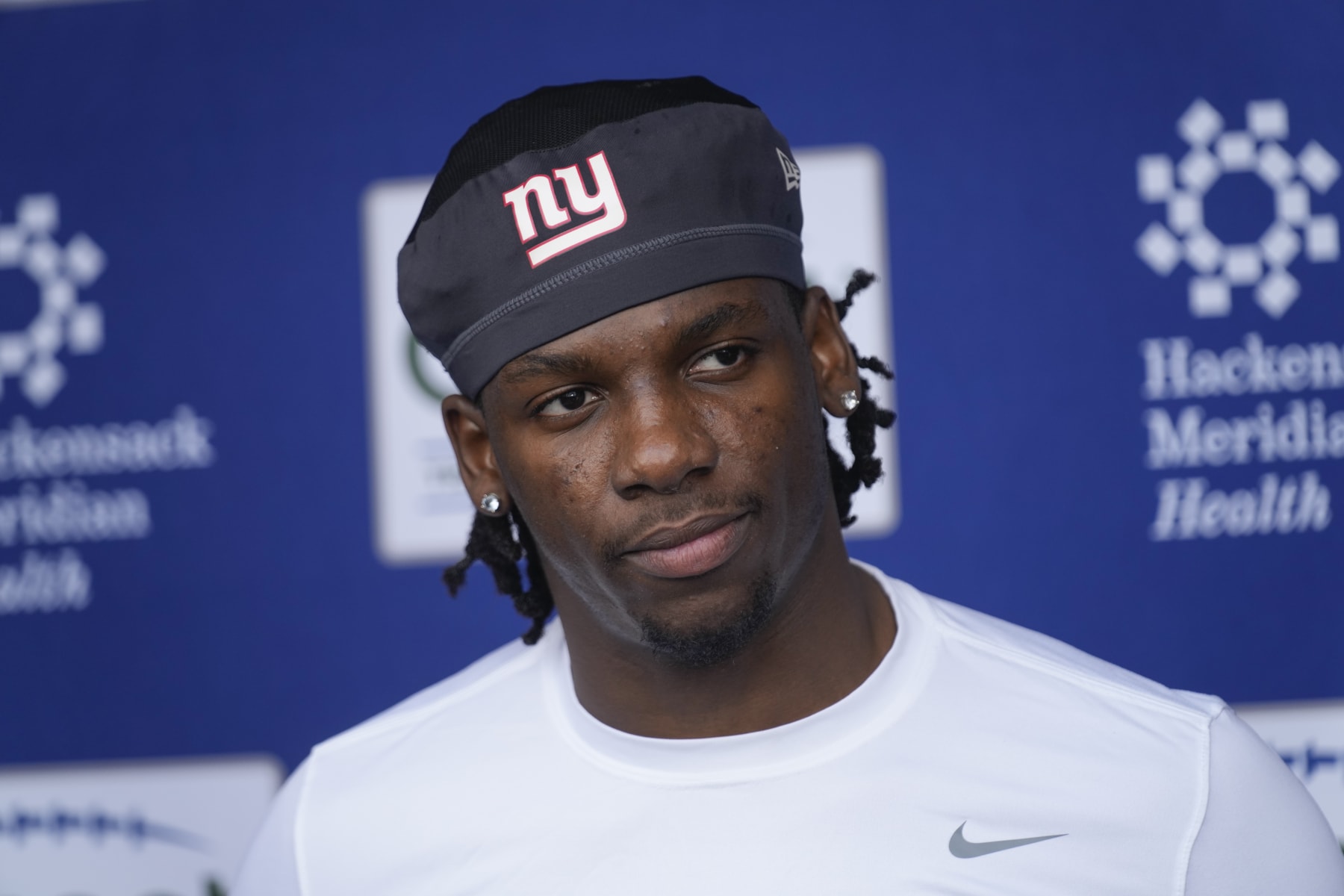 Cornerback Deonte Banks talks to reporters after an NFL football rookie camp at the New York Giants training facility in East Rutherford, N.J., Friday, May 5, 2023. (AP Photo/Seth Wenig)