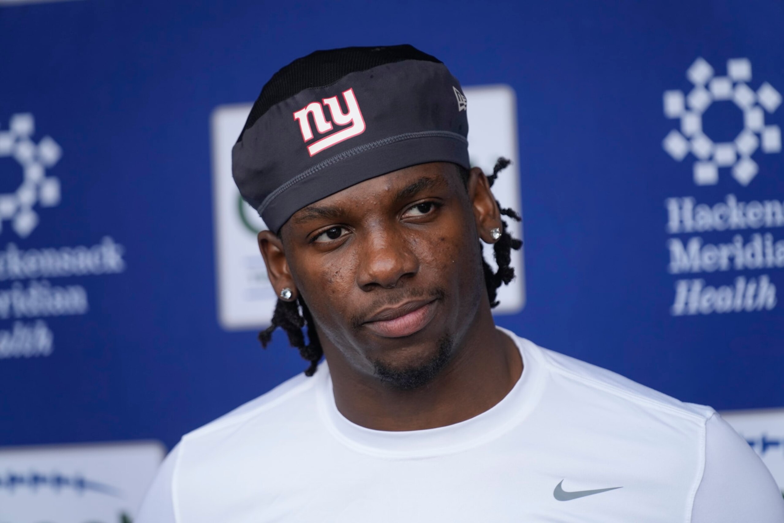 Cornerback Deonte Banks talks to reporters after an NFL football rookie camp at the New York Giants training facility in East Rutherford, N.J., Friday, May 5, 2023. (AP Photo/Seth Wenig)