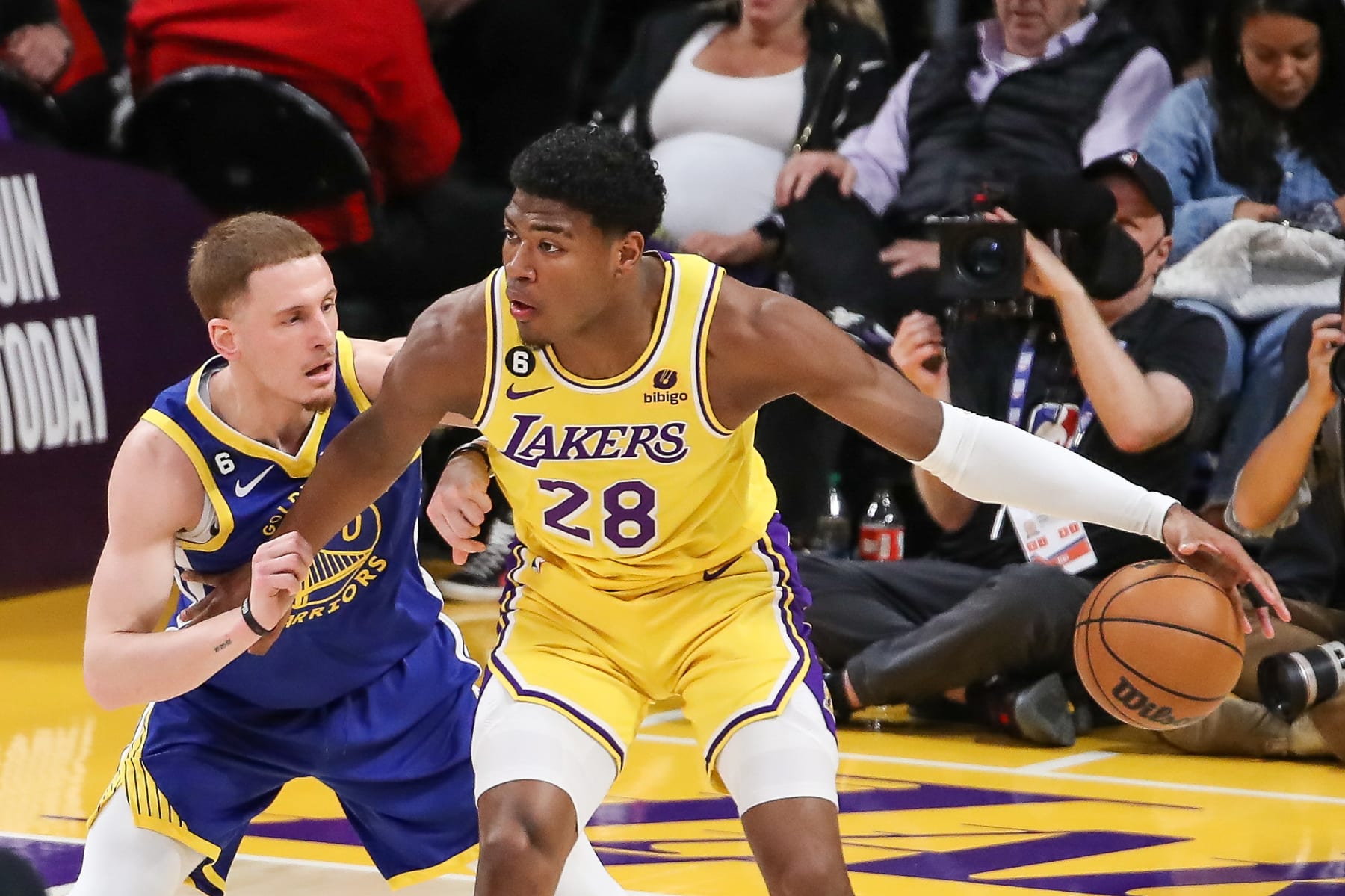 LOS ANGELES, CA - MAY 08: Los Angeles Lakers forward Rui Hachimura (28) backs down Golden State Warriors guard Donte DiVincenzo (0) during game 4 of the NBA Western Conference Semifinals between the Golden State Warriors and the Los Angeles Lakers on May 08, 2023, at Crypto.com Arena in Los Angeles, CA. (Photo by Jevone Moore/Icon Sportswire via Getty Images)