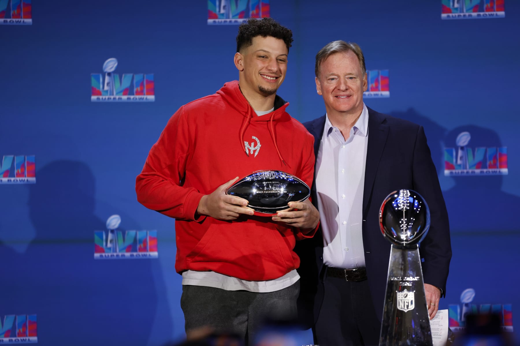 PHOENIX, ARIZONA - FEBRUARY 13: Kansas City Chiefs MVP Quarterback Patrick Mahomes stands with NFL Commissioner Roger Goodell during a press conference at Phoenix Convention Center on February 13, 2023 in Phoenix, Arizona. (Photo by Carmen Mandato/Getty Images)