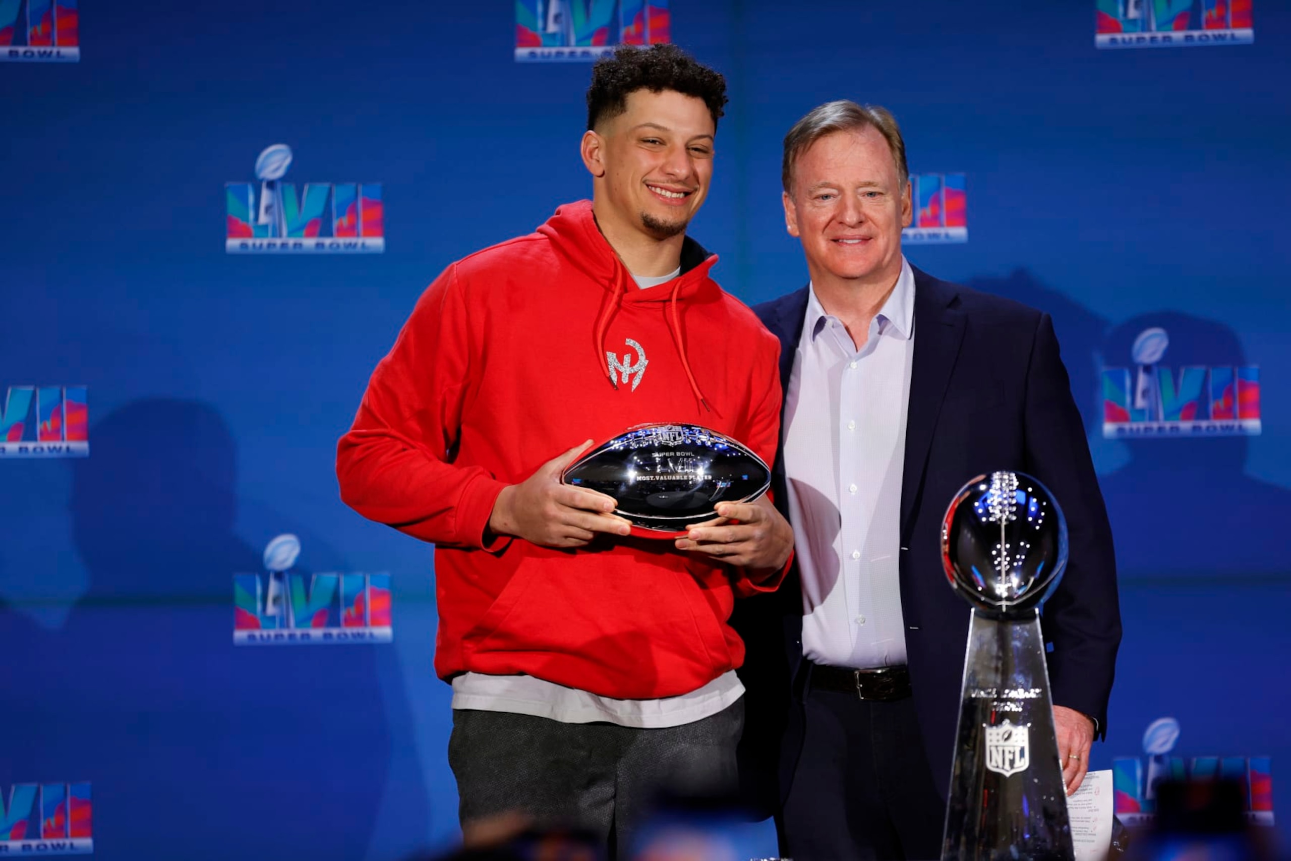 PHOENIX, ARIZONA - FEBRUARY 13: Kansas City Chiefs MVP Quarterback Patrick Mahomes stands with NFL Commissioner Roger Goodell during a press conference at Phoenix Convention Center on February 13, 2023 in Phoenix, Arizona. (Photo by Carmen Mandato/Getty Images)