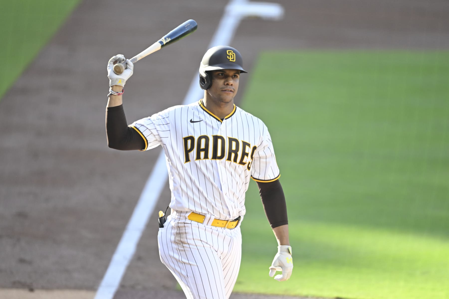 SAN DIEGO, CA - AUGUST 5:  Juan Soto #22 of the San Diego Padres tosses his bat after striking out during the first inning of a baseball game against the Los Angeles Dodgers on August 5, 2023 at Petco Park in San Diego, California. (Photo by Denis Poroy/Getty Images)