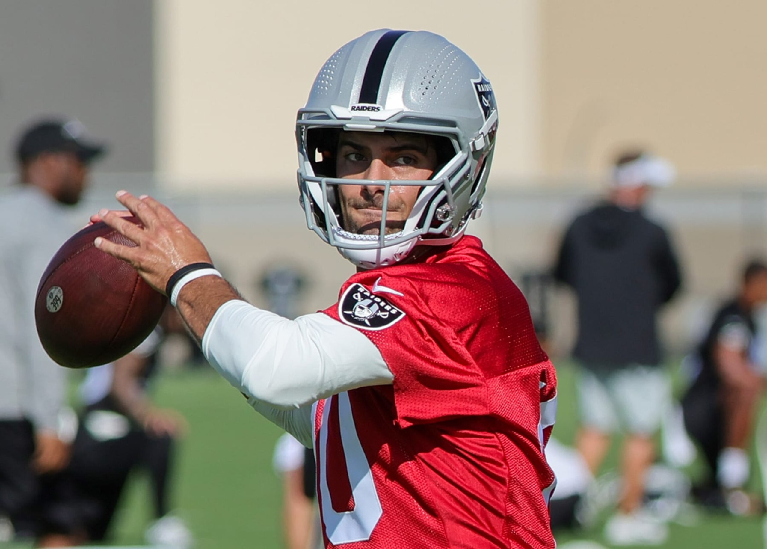 HENDERSON, NEVADA - JULY 26: Quarterback Jimmy Garoppolo #10 of the Las Vegas Raiders throws during the first practice of the team's training camp at the Las Vegas Raiders Headquarters/Intermountain Healthcare Performance Center on July 26, 2023 in Henderson, Nevada. (Photo by Ethan Miller/Getty Images)