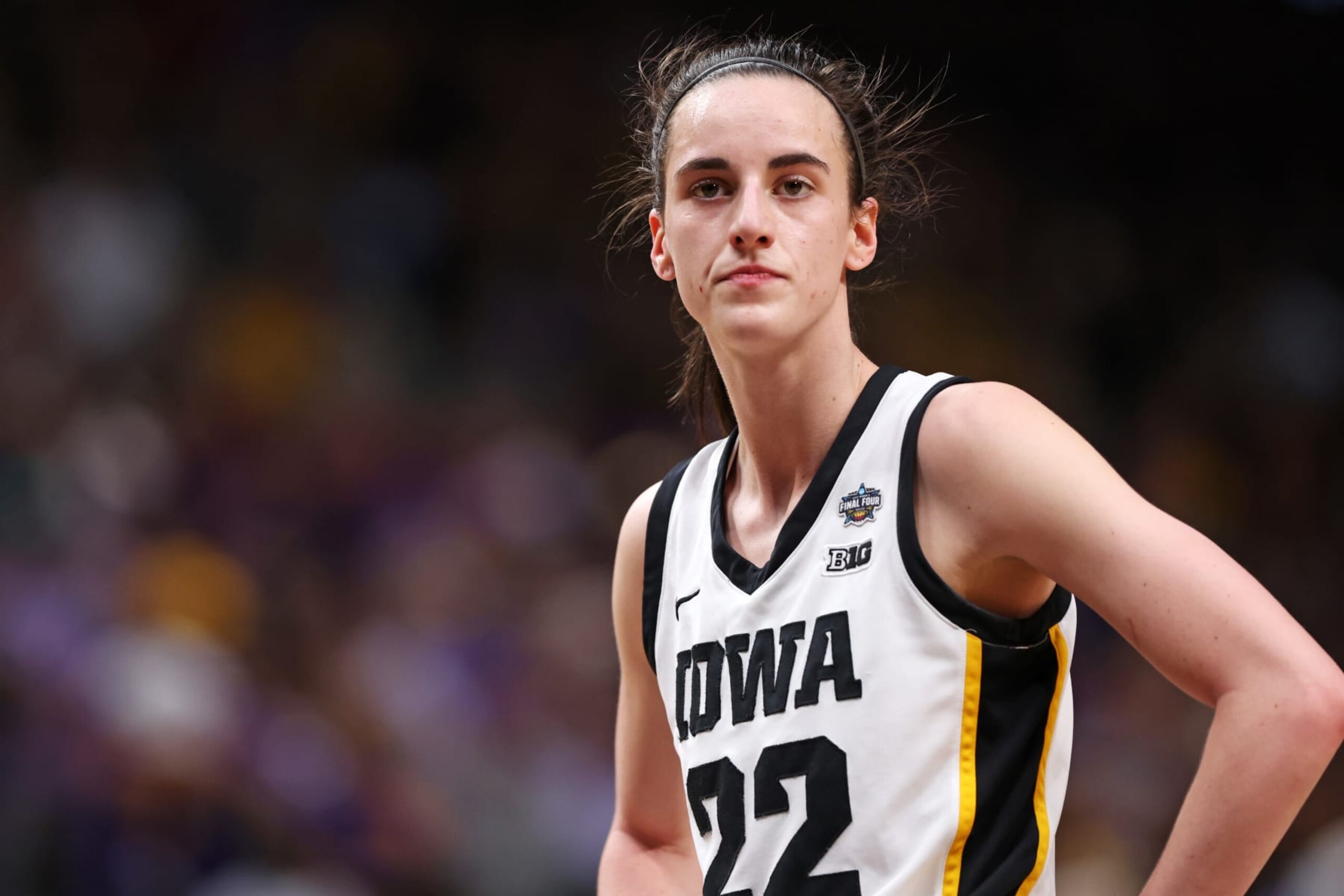 DALLAS, TEXAS - APRIL 02: Caitlin Clark #22 of the Iowa Hawkeyes reacts during the first half against the LSU Lady Tigers during the 2023 NCAA Women's Basketball Tournament championship game at American Airlines Center on April 02, 2023 in Dallas, Texas. (Photo by Maddie Meyer/Getty Images) DALLAS, TEXAS - APRIL 02: Caitlin Clark #22 of the Iowa Hawkeyes reacts during the first half against the LSU Lady Tigers during the 2023 NCAA Women's Basketball Tournament championship game at American Airlines Center on April 02, 2023 in Dallas, Texas. (Photo by Maddie Meyer/Getty Images)