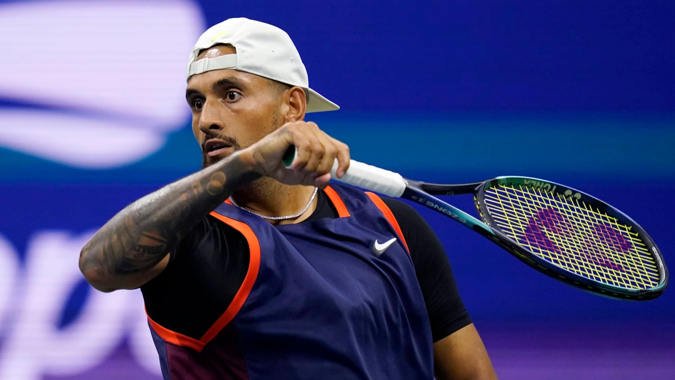 Nick Kyrgios, of Australia, returns to Karen Khachanov, of Russia, during the quarterfinals of the U.S. Open tennis championships, Tuesday, Sept. 6, 2022, in New York. (AP Photo/Charles Krupa)