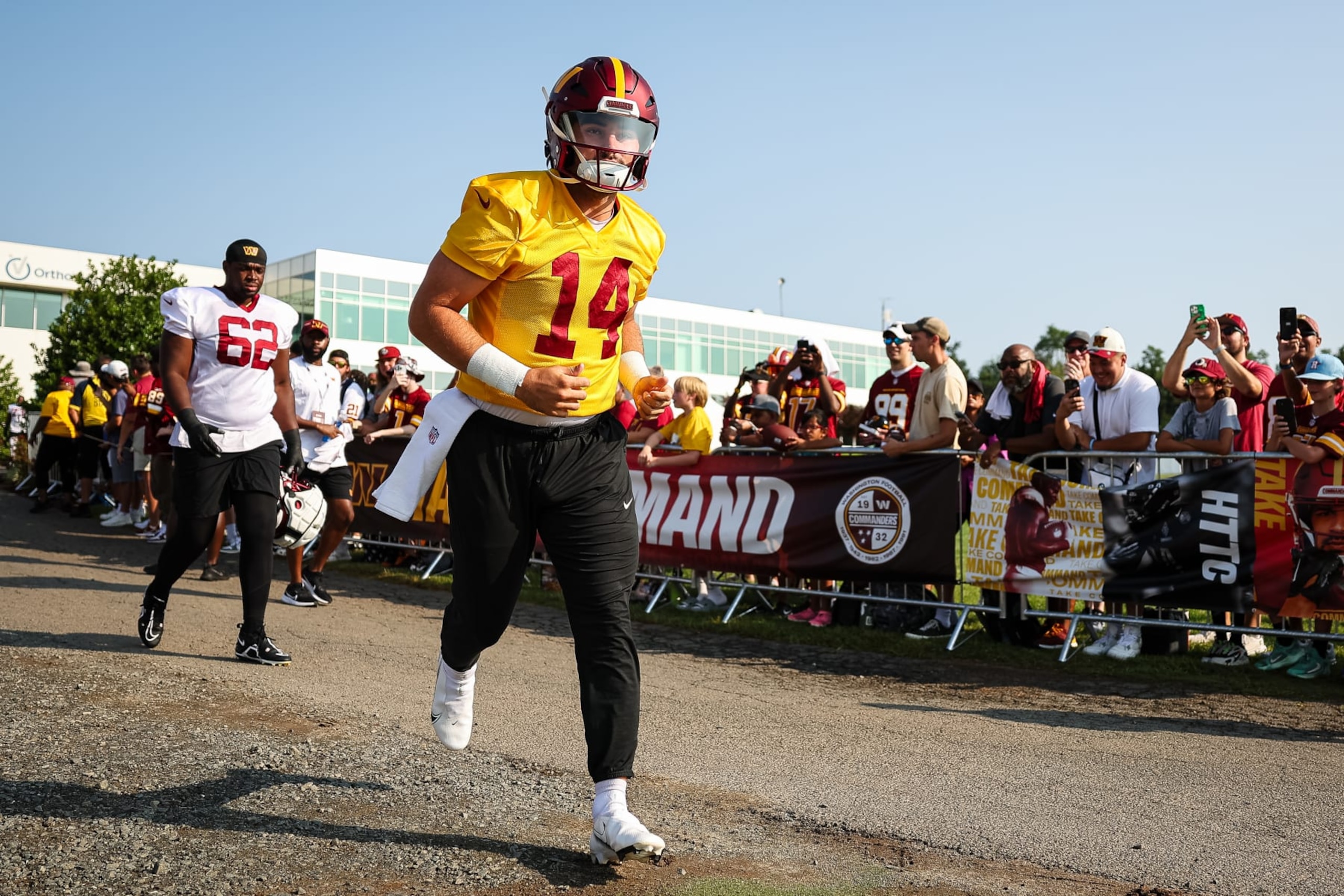 ASHBURN, VA - JULY 28: Sam Howell #14 of the Washington Commanders takes the field during training camp at OrthoVirginia Training Center on July 28, 2022 in Ashburn, Virginia. (Photo by Scott Taetsch/Getty Images)