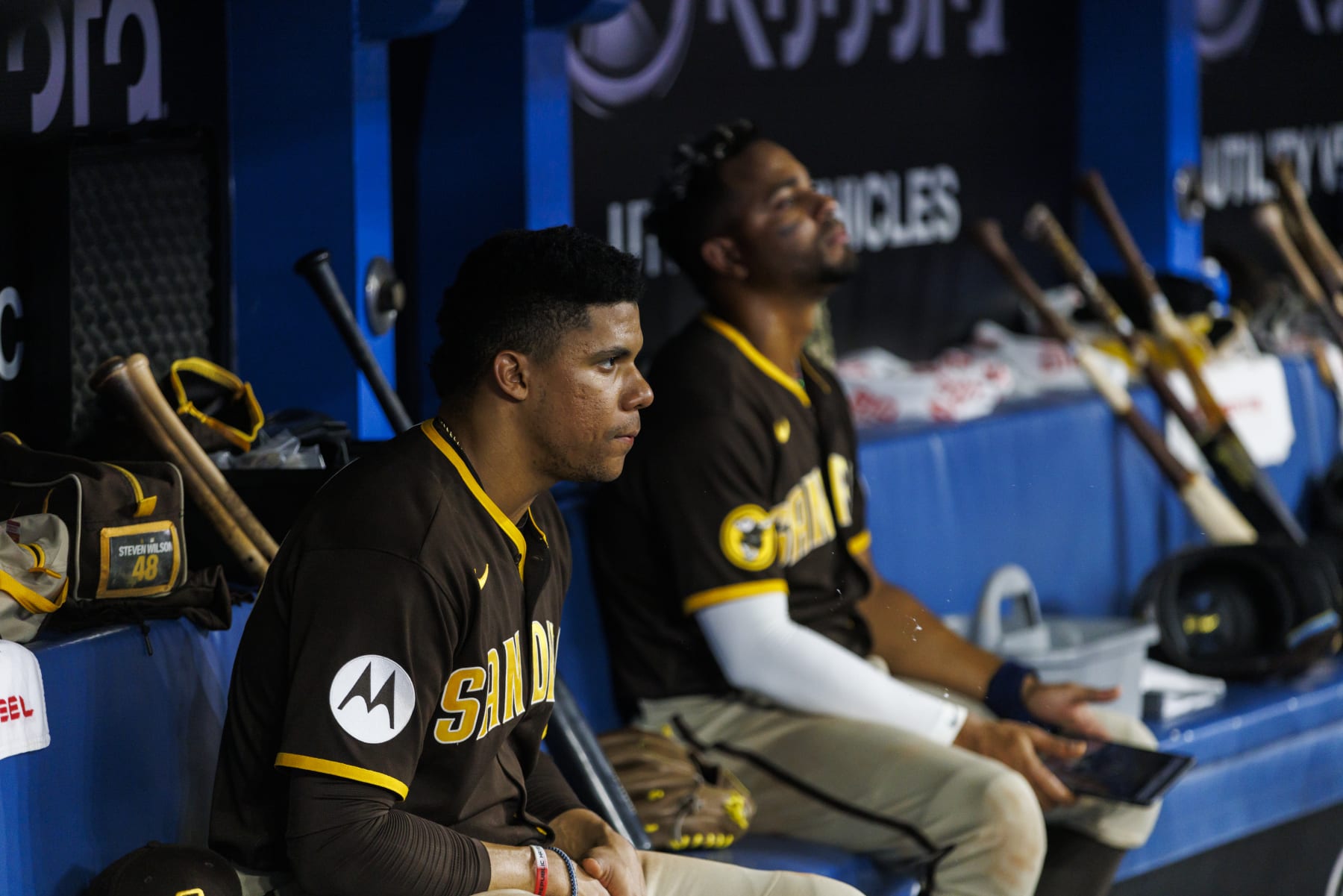 TORONTO, CANADA - JULY 19:  Juan Soto #22 of the San Diego Padres sits in the dugout during their MLB game against the Toronto Blue Jays at Rogers Centre on July 19, 2023 in Toronto, Canada. (Photo by Cole Burston/Getty Images)
