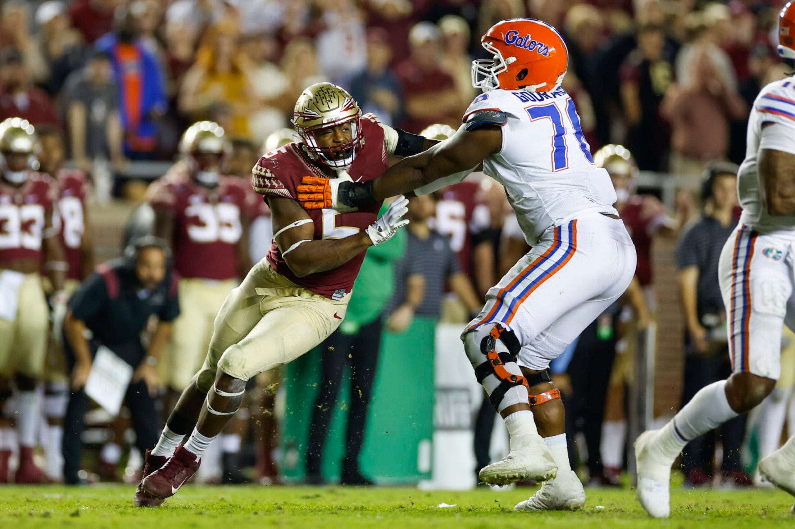 TALLAHASSEE, FL - NOVEMBER 25: Florida State Seminoles defensive lineman Jared Verse (5) battles Florida Gators offensive lineman Richard Gouraige (76) during the game between the Florida Gators and the Florida State Seminoles on November 25, 2022 at Doak Campbell Stadium in Tallahassee, Fl. (Photo by David Rosenblum/Icon Sportswire via Getty Images)