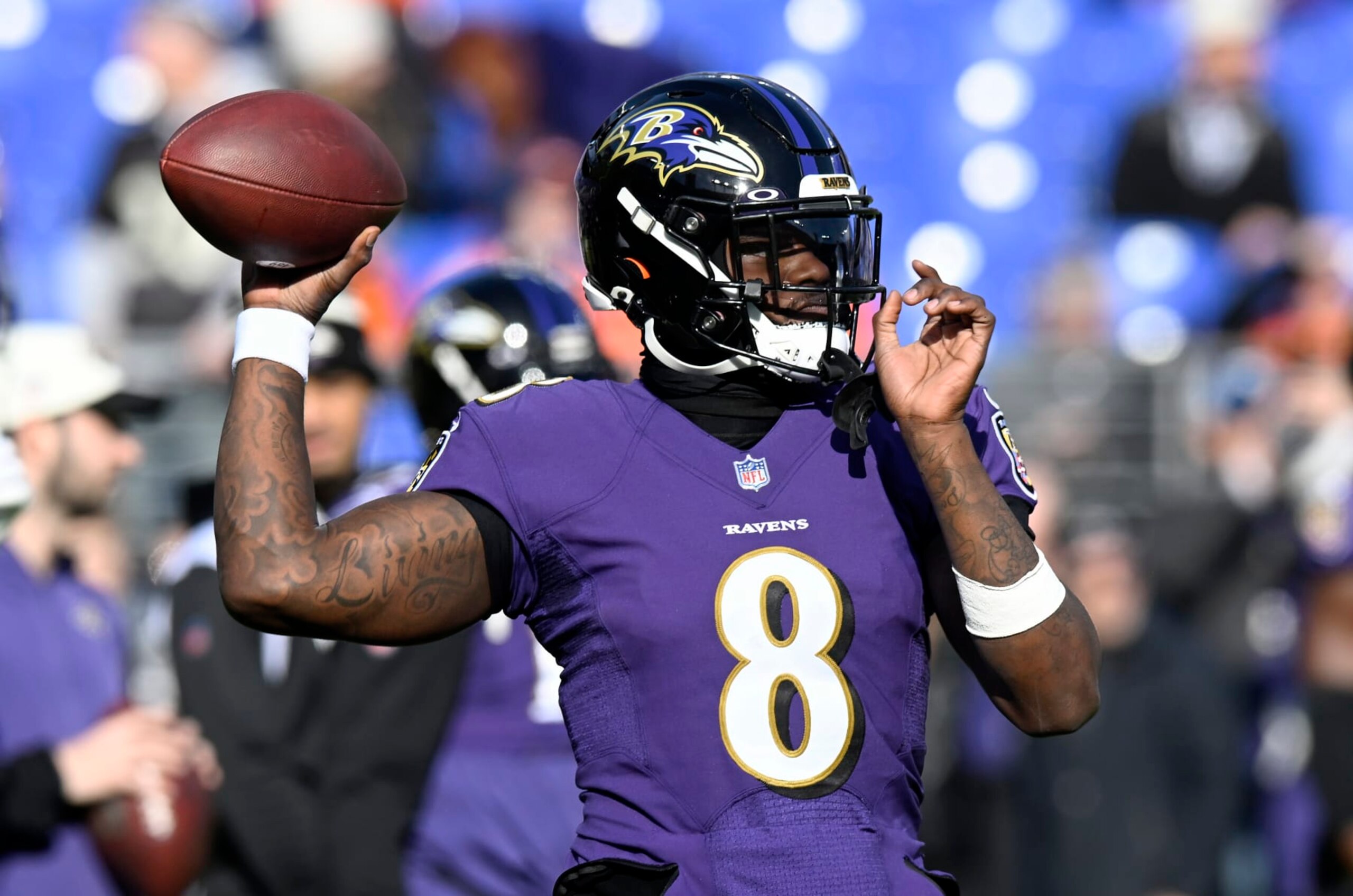 BALTIMORE, MARYLAND - DECEMBER 04: Lamar Jackson #8 of the Baltimore Ravens warms up before the game against the Denver Broncos at M&T Bank Stadium on December 04, 2022 in Baltimore, Maryland. (Photo by G Fiume/Getty Images)