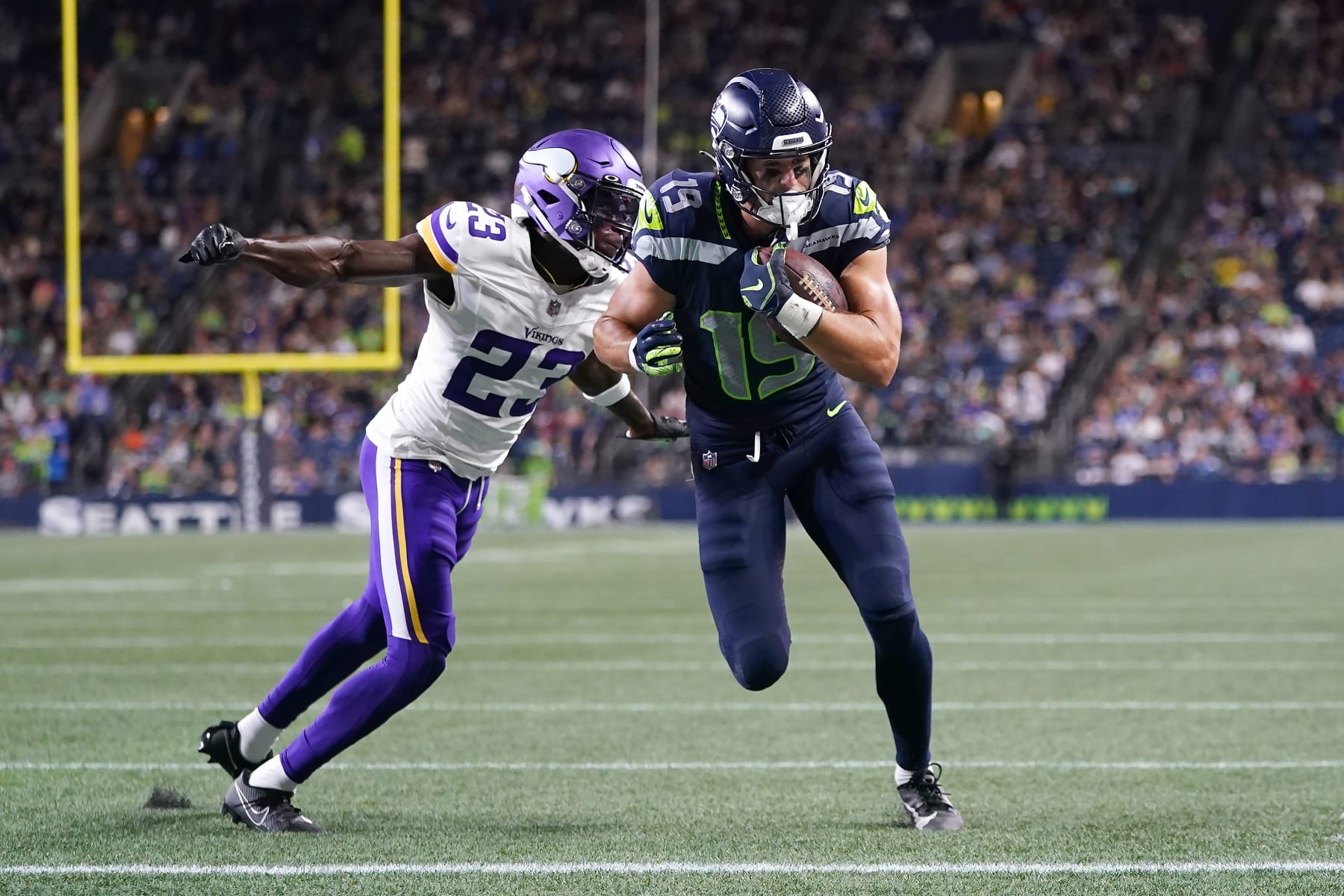 Seahawks WR Jake Bobo beats Vikings CB Andrew Booth Jr. for a touchdown in Thursday's preseason game. 