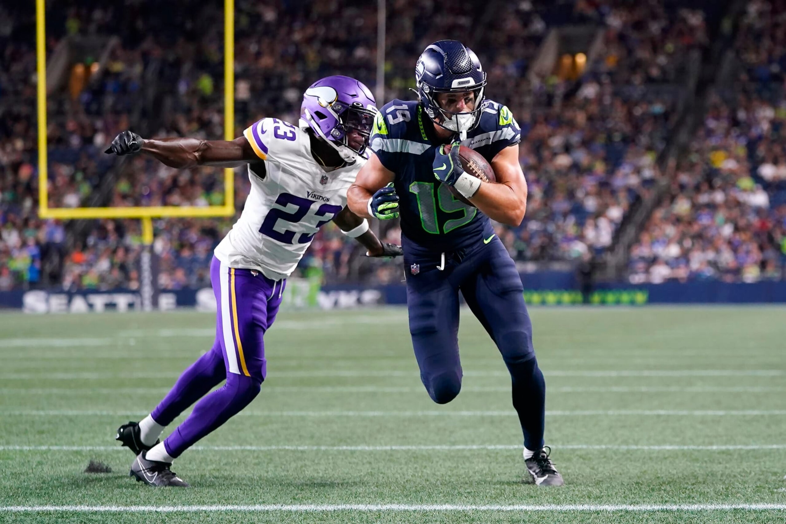 Seahawks WR Jake Bobo beats Vikings CB Andrew Booth Jr. for a touchdown in Thursday's preseason game. 