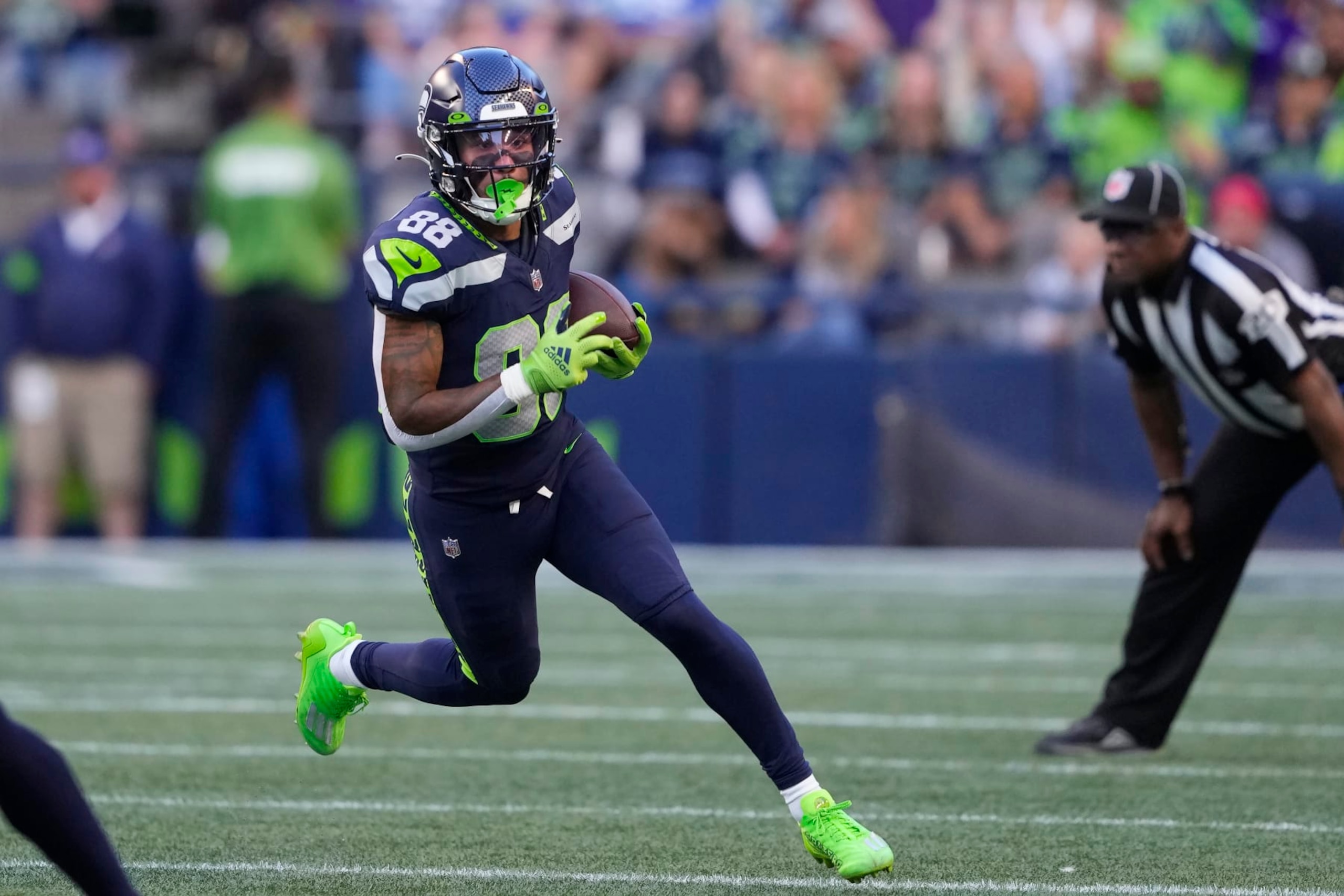Seattle Seahawks wide receiver Cade Johnson (88) runs against the Minnesota Vikings during the first half of an NFL preseason football game in Seattle, Thursday, Aug. 10, 2023. (AP Photo/Lindsey Wasson)