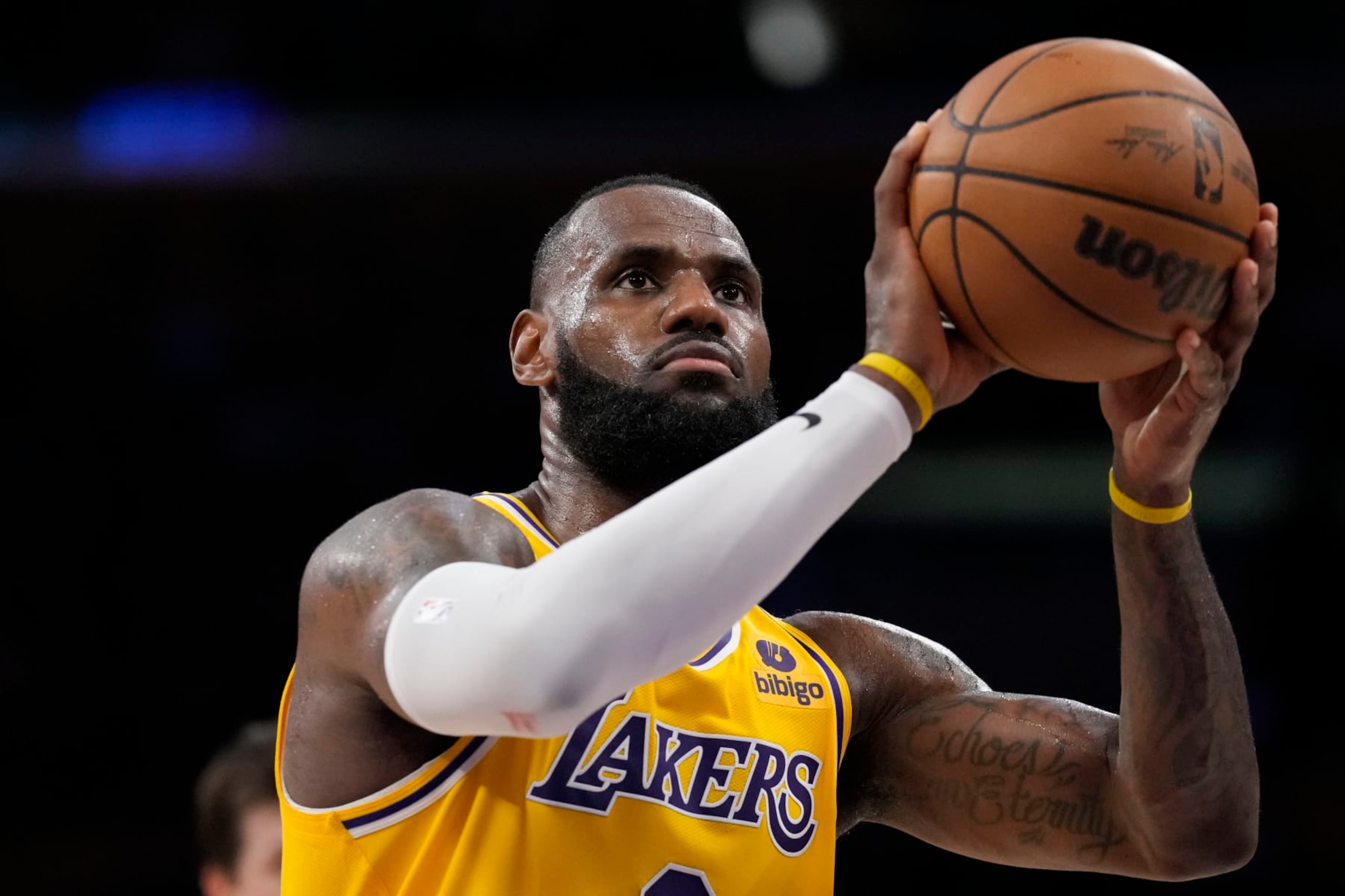 Los Angeles Lakers forward LeBron James shoots a free throw in the first half of Game 4 of the NBA basketball Western Conference Final series against the Denver Nuggets Monday, May 22, 2023, in Los Angeles. (AP Photo/Ashley Landis)