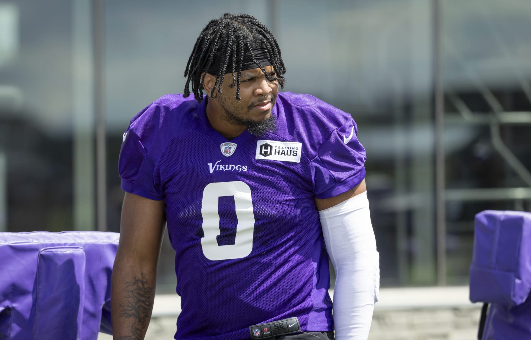 Minnesota Vikings linebacker Marcus Davenport prepares for drills before an NFL football practice Saturday, July 29, 2023, in Eagan, Minn. (AP Photo/Bruce Kluckhohn)