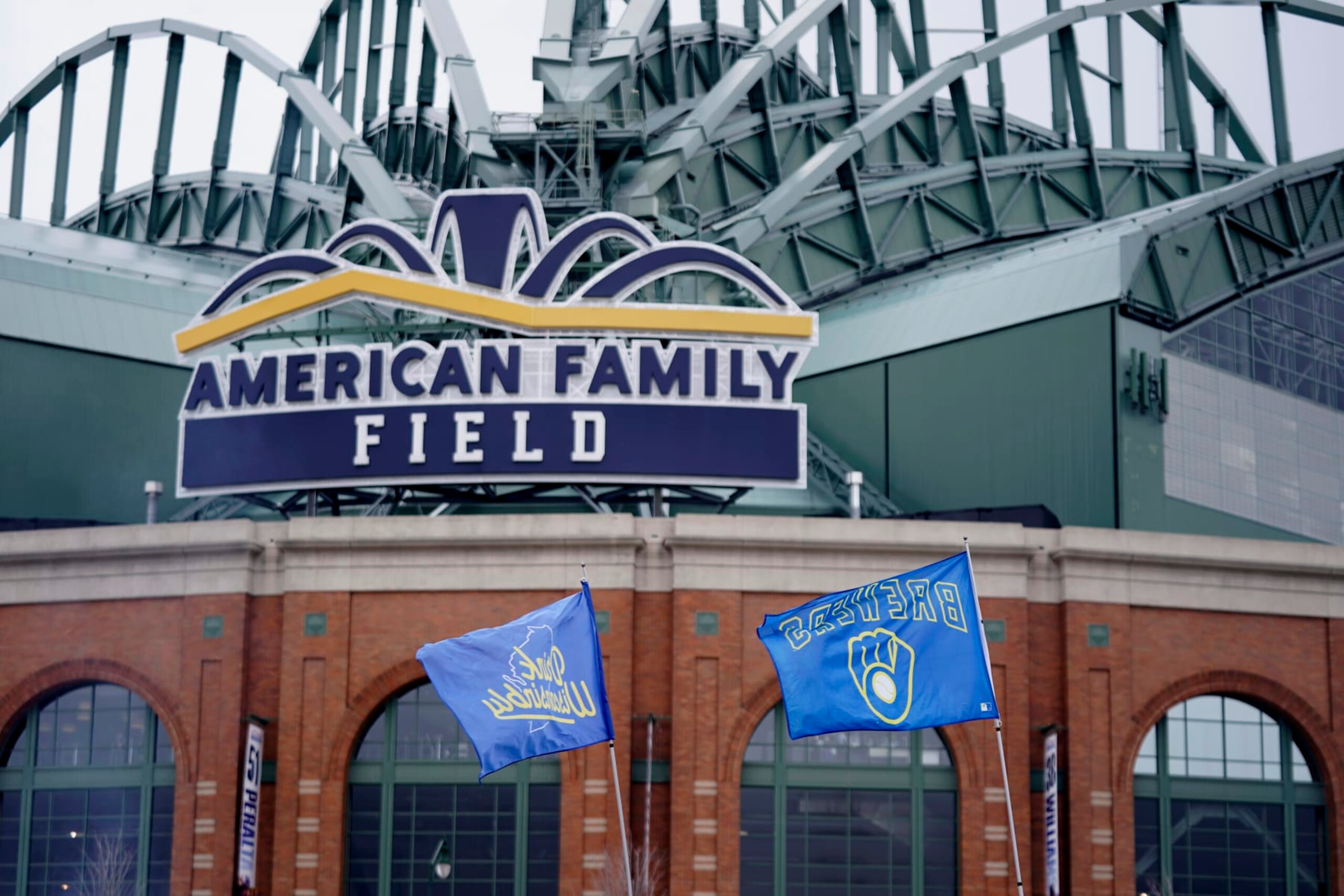 Flags fly in front of American Family Field before a baseball game between the Milwaukee Brewers and the New York Mets Monday, April 3, 2023, in Milwaukee. (AP Photo/Aaron Gash) Flags fly in front of American Family Field before a baseball game between the Milwaukee Brewers and the New York Mets Monday, April 3, 2023, in Milwaukee. (AP Photo/Aaron Gash)
