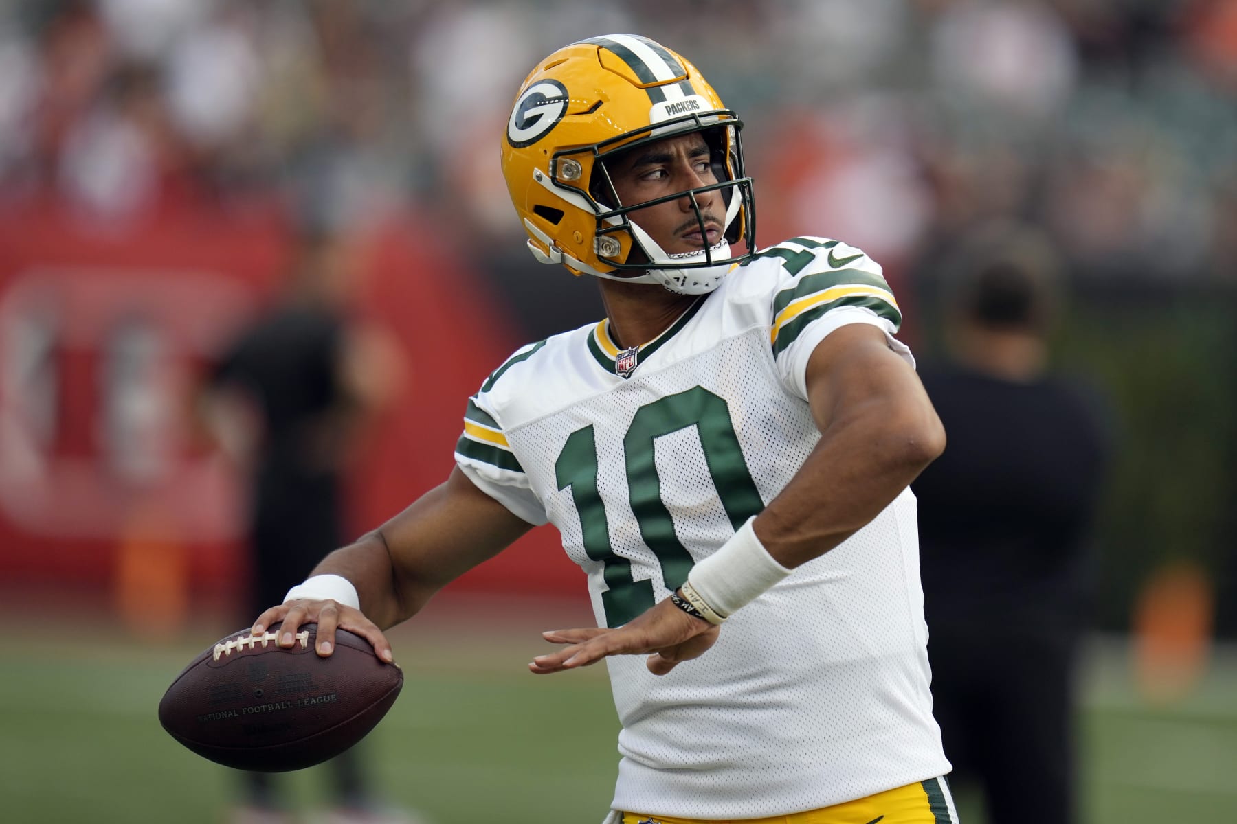 Green Bay Packers quarterback Jordan Love warms up before a preseason NFL football game against the Cincinnati Bengals Friday, Aug. 11, 2023, in Cincinnati. (AP Photo/Michael Conroy)