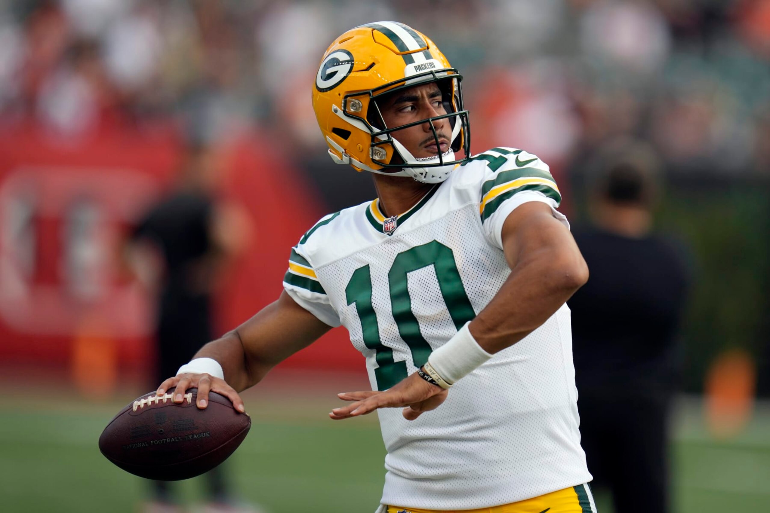 Green Bay Packers quarterback Jordan Love warms up before a preseason NFL football game against the Cincinnati Bengals Friday, Aug. 11, 2023, in Cincinnati. (AP Photo/Michael Conroy)