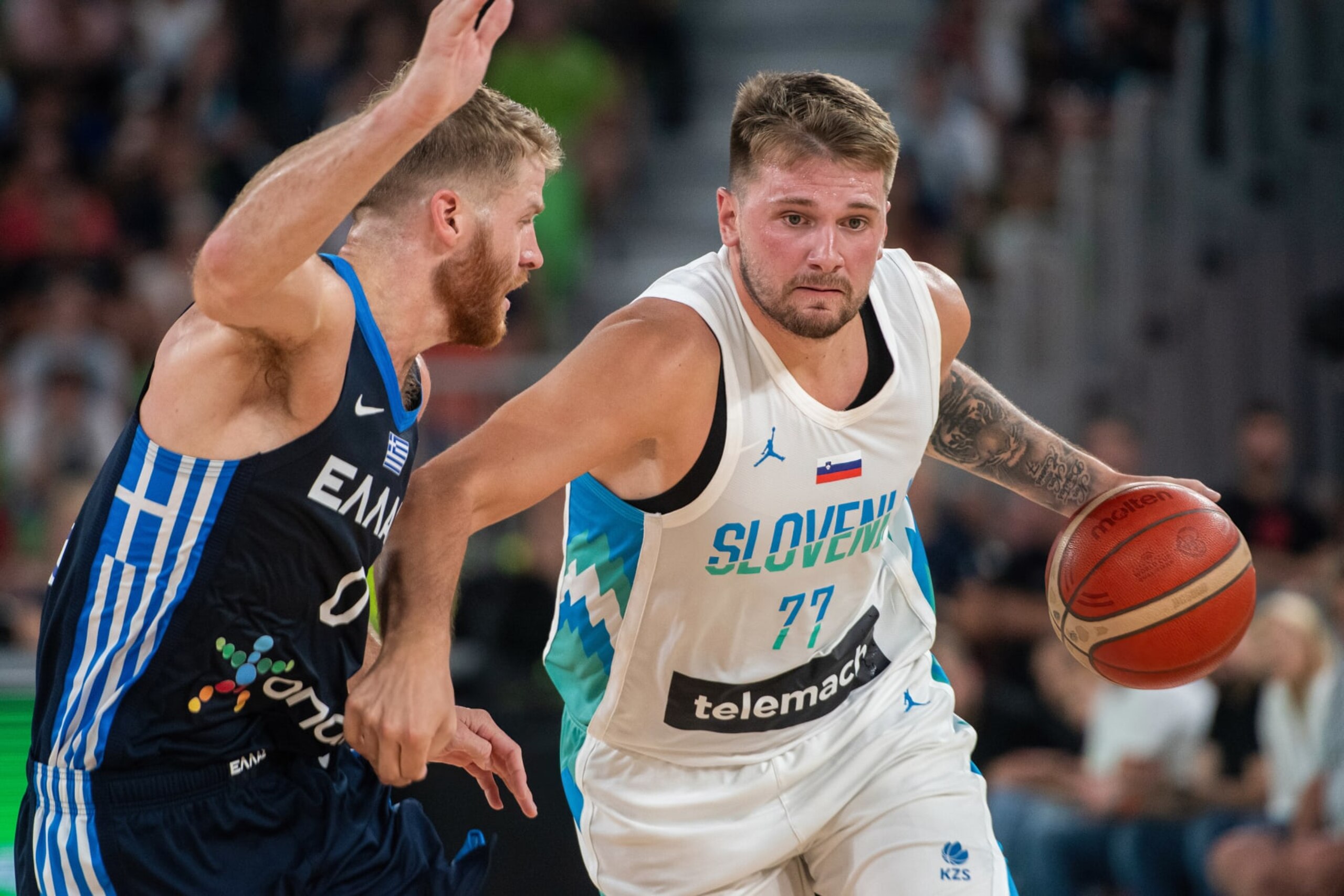 LJUBLJANA, SLOVENIA - 2023/08/02: (L-R) Thomas Walkup of Greece and Luka Doncic of Slovenia seen in action during the International friendly basketball game between Slovenia and Greece at Arena Stozice. Final score; Slovenia 91: 98 Greece. (Photo by Milos Vujinovic/SOPA Images/LightRocket via Getty Images) LJUBLJANA, SLOVENIA - 2023/08/02: (L-R) Thomas Walkup of Greece and Luka Doncic of Slovenia seen in action during the International friendly basketball game between Slovenia and Greece at Arena Stozice. Final score; Slovenia 91: 98 Greece. (Photo by Milos Vujinovic/SOPA Images/LightRocket via Getty Images)