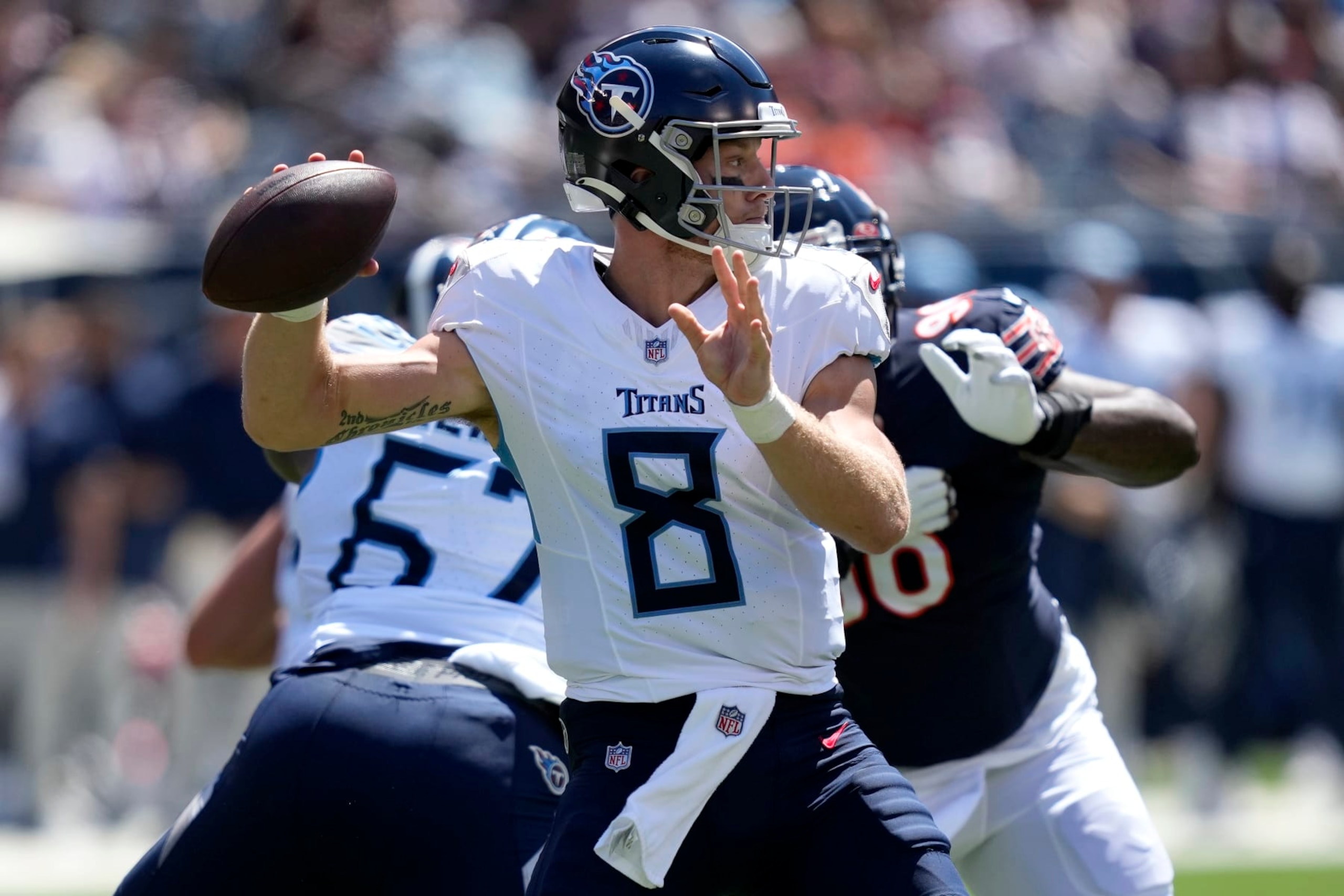 Tennessee Titans quarterback Will Levis (8) throws against the Chicago Bears during the first half of an NFL preseason football game, Saturday, Aug. 12, 2023, in Chicago. (AP Photo/Charles Rex Arbogast)