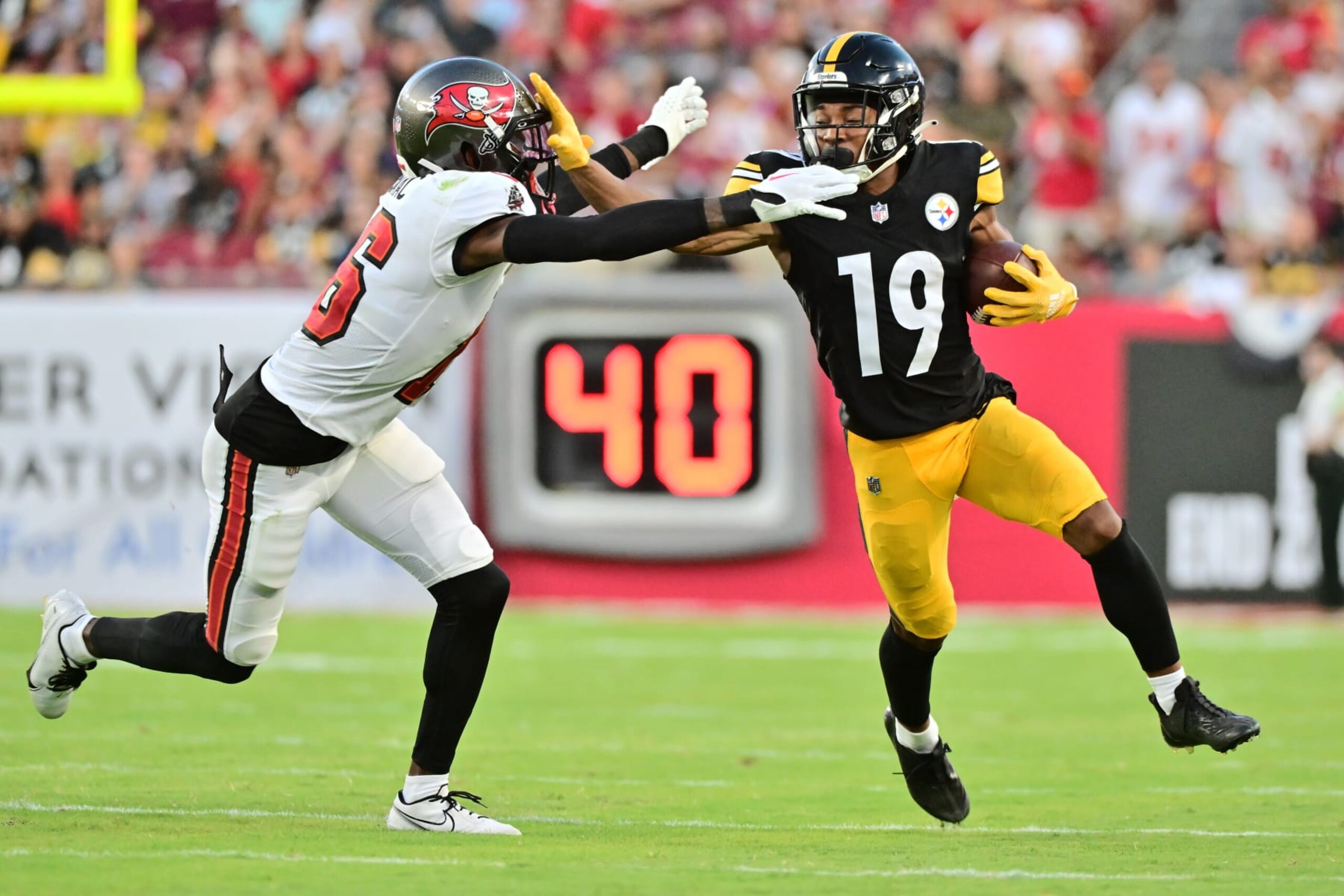 Steelers WR Calvin Austin III works past Buccaneers CB Keenan Isaac 