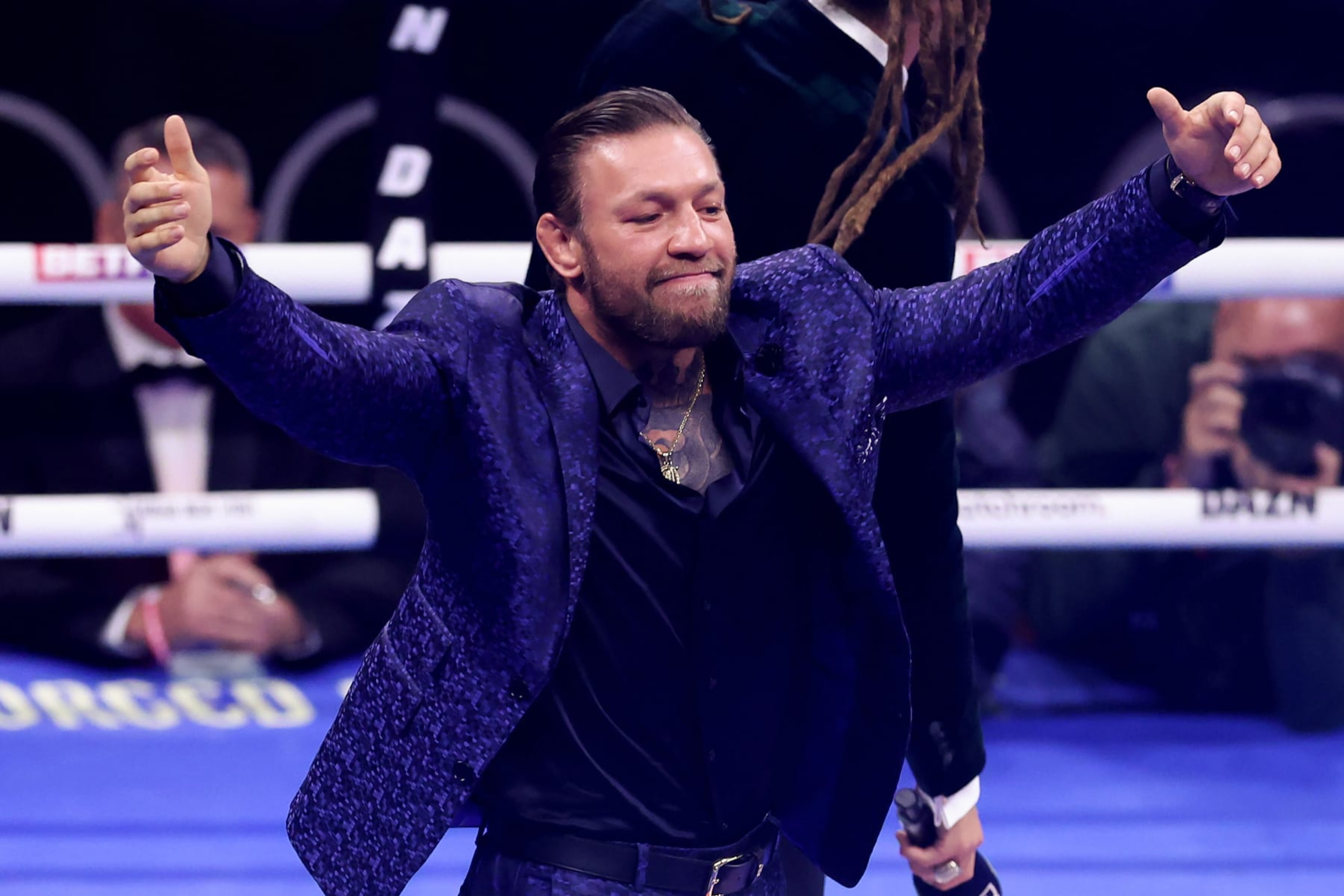 LONDON, ENGLAND - AUGUST 12: Mixed Martial Artist Conor McGregor acknowledges the fans prior to the Heavyweight fight between Derek Chisora and Gerald Washington at The O2 Arena on August 12, 2023 in London, England. (Photo by Julian Finney/Getty Images) LONDON, ENGLAND - AUGUST 12: Mixed Martial Artist Conor McGregor acknowledges the fans prior to the Heavyweight fight between Derek Chisora and Gerald Washington at The O2 Arena on August 12, 2023 in London, England. (Photo by Julian Finney/Getty Images)