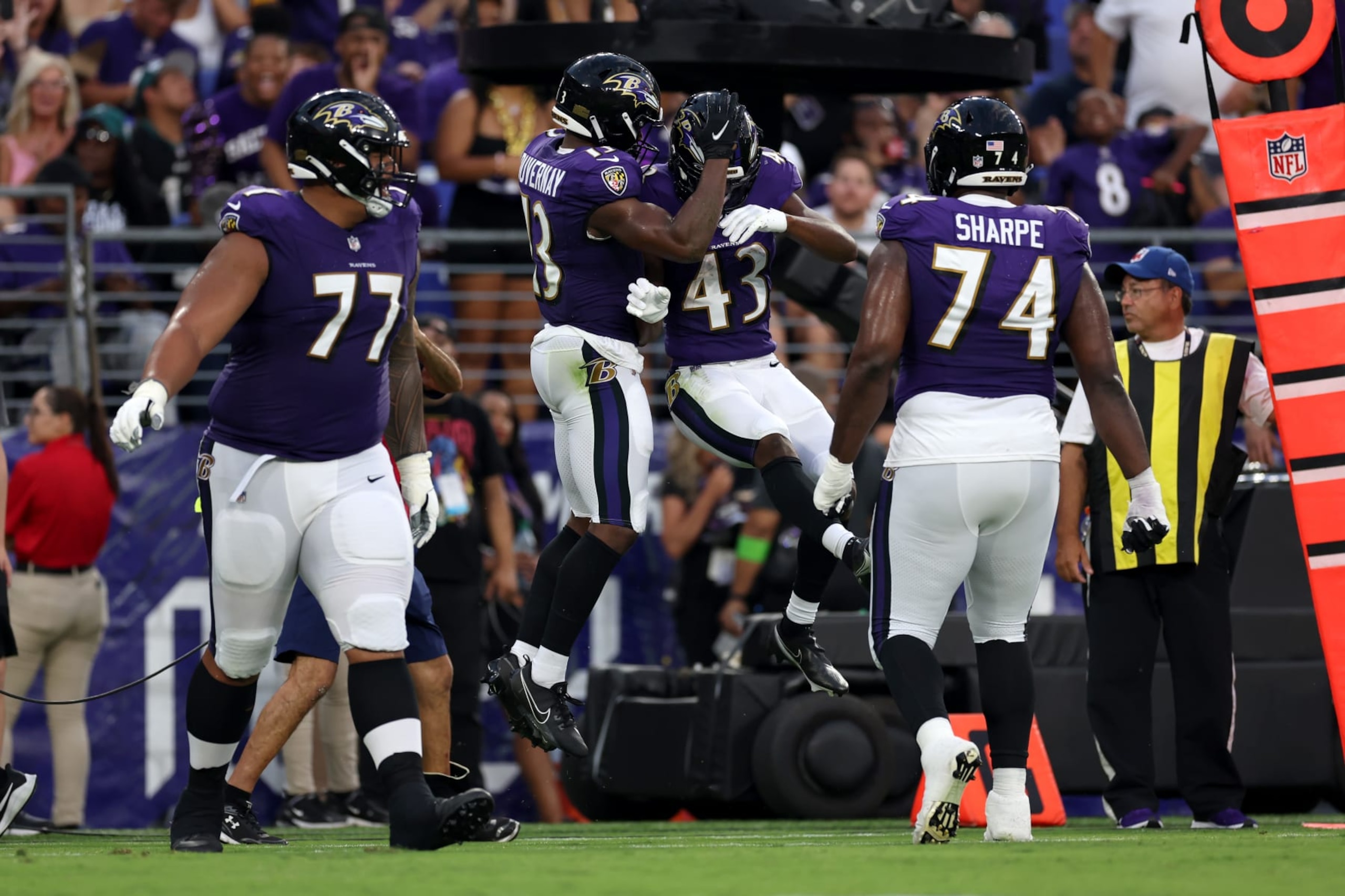 BALTIMORE, MARYLAND - AUGUST 12: Wide receiver Devin Duvernay #13 of the Baltimore Ravens celebrates with running back Justice Hill #43 after catching a first half touchdown pass against the Philadelphia Eagles during a preseason game at M&T Bank Stadium on August 12, 2023 in Baltimore, Maryland. (Photo by Rob Carr/Getty Images)