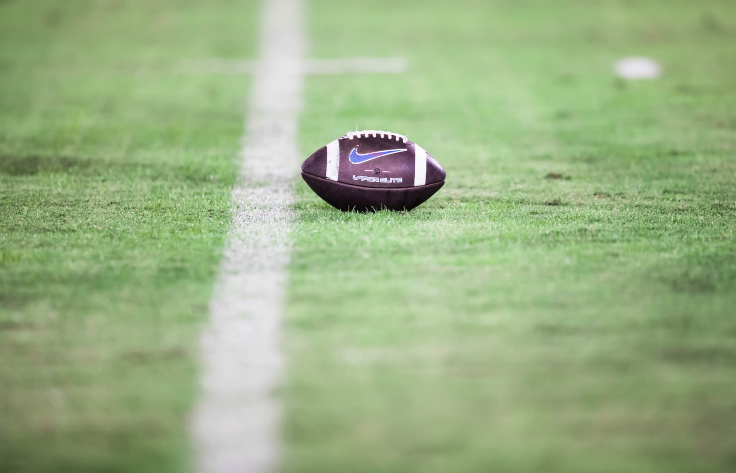 PALO ALTO, CA - NOVEMBER 26: A close-up view of a football on the field at the Stanford Stadium during an NCAA college football game between the BYU Cougars and the Stanford Cardinal on November 26, 2022 in Palo Alto, California.  (Photo by David Madison/Getty Images)