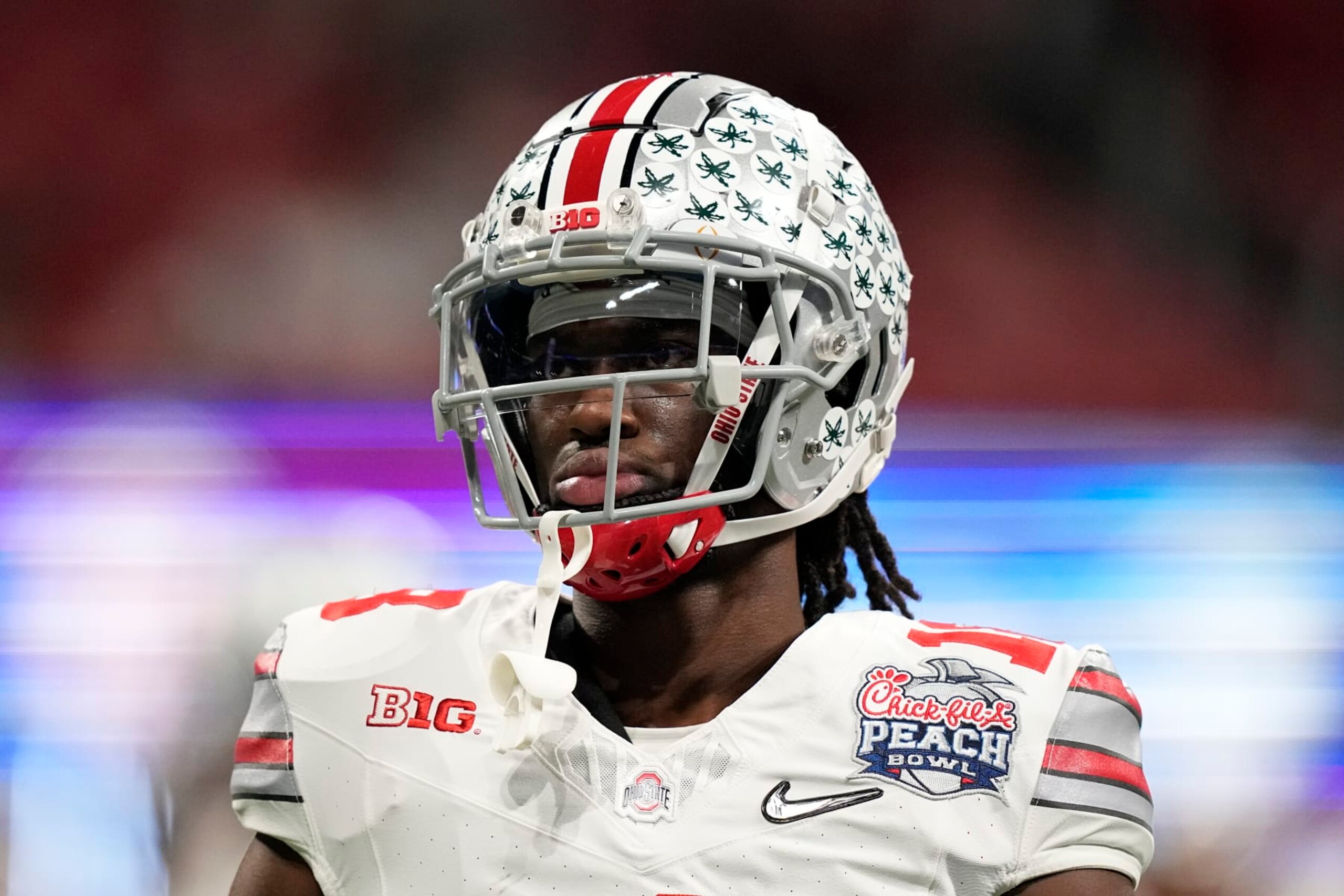 Ohio State wide receiver Marvin Harrison Jr. (18) warms up before the Peach Bowl NCAA college football semifinal playoff game between Georgia and Ohio State, Saturday, Dec. 31, 2022, in Atlanta. (AP Photo/Brynn Anderson)