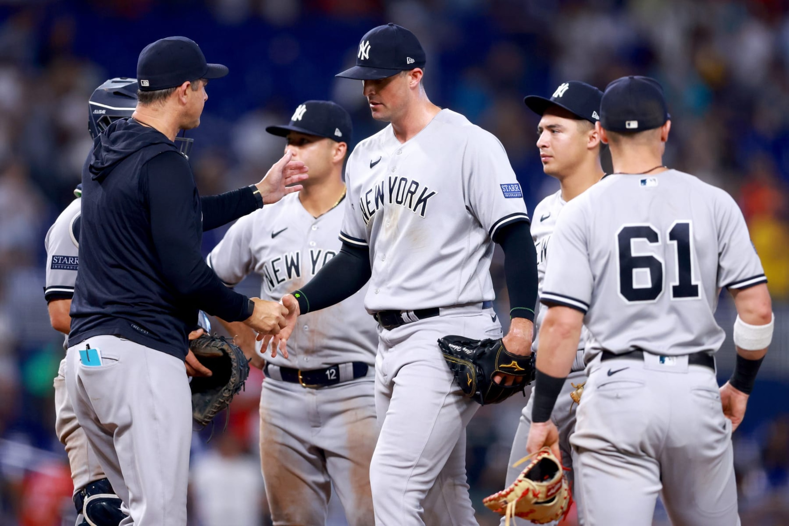 MIAMI, FLORIDA - AUGUST 13: Clay Holmes #35 of the New York Yankees walks off the field after being pulled from the game against the Miami Marlins during the ninth inning at loanDepot park on August 13, 2023 in Miami, Florida. (Photo by Megan Briggs/Getty Images)