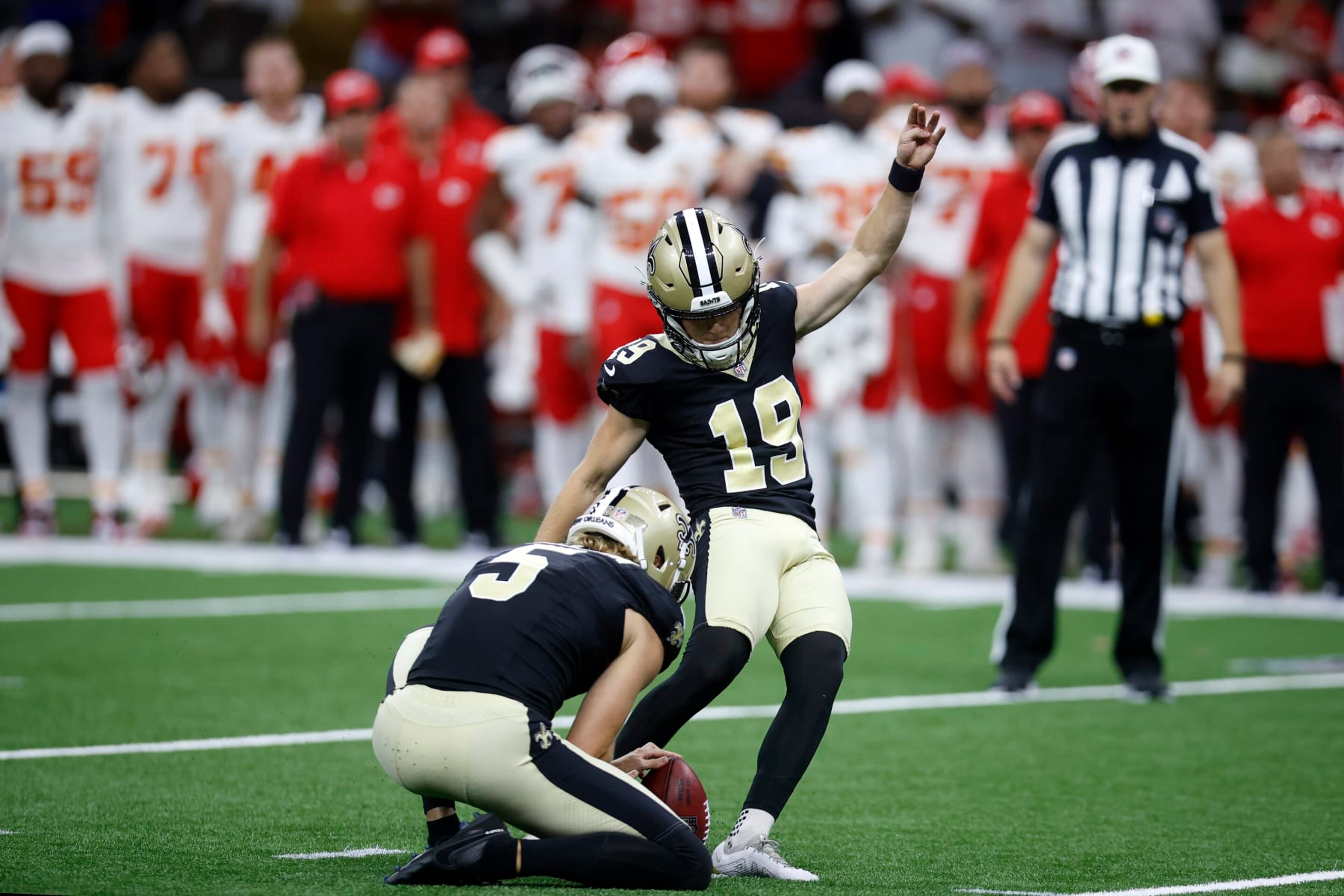 NEW ORLEANS, LOUISIANA - AUGUST 13: Blake Grupe #19 of the New Orleans Saints kicks a game-winning field goal during a preseason game against the Kansas City Chiefs at Caesars Superdome on August 13, 2023 in New Orleans, Louisiana. (Photo by Chris Graythen/Getty Images) NEW ORLEANS, LOUISIANA - AUGUST 13: Blake Grupe #19 of the New Orleans Saints kicks a game-winning field goal during a preseason game against the Kansas City Chiefs at Caesars Superdome on August 13, 2023 in New Orleans, Louisiana. (Photo by Chris Graythen/Getty Images)