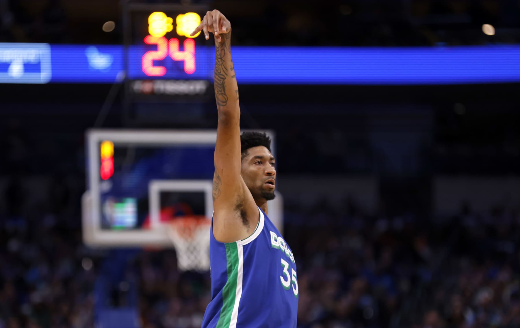 DALLAS, TX - APRIL 5: Christian Wood #35 of the Dallas Mavericks celebrates a three point basket against the Sacramento Kings in the second half at American Airlines Center on April 5, 2023 in Dallas, Texas. The Mavericks won 123-119. NOTE TO USER: User expressly acknowledges and agrees that, by downloading and or using this photograph, User is consenting to the terms and conditions of the Getty Images License Agreement. (Photo by Ron Jenkins/Getty Images)