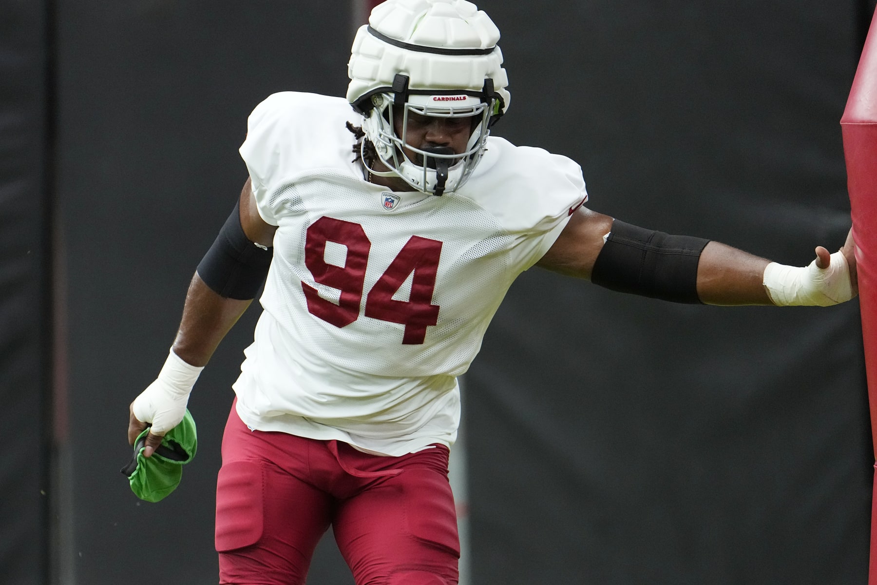 Arizona Cardinals defensive tackle Carlos Watkins pauses during NFL football training camp practice at State Farm Stadium Thursday, Aug. 3, 2023, in Glendale, Ariz. (AP Photo/Ross D. Franklin)