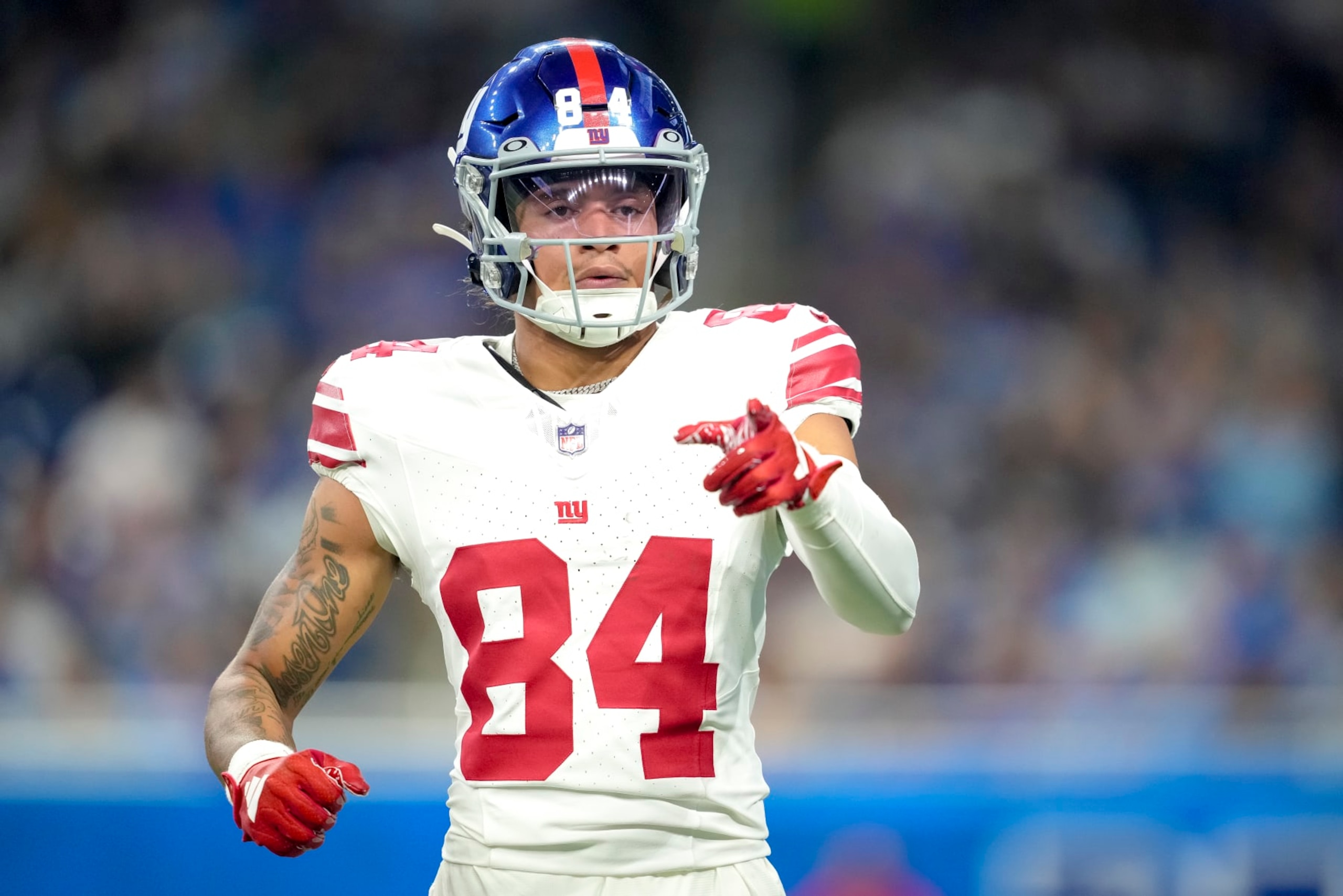 DETROIT, MICHIGAN - AUGUST 11: Jalin Hyatt #84 of the New York Giants looks on and points against the Detroit Lions during the preseason game at Ford Field on August 11, 2023 in Detroit, Michigan. (Photo by Nic Antaya/Getty Images)