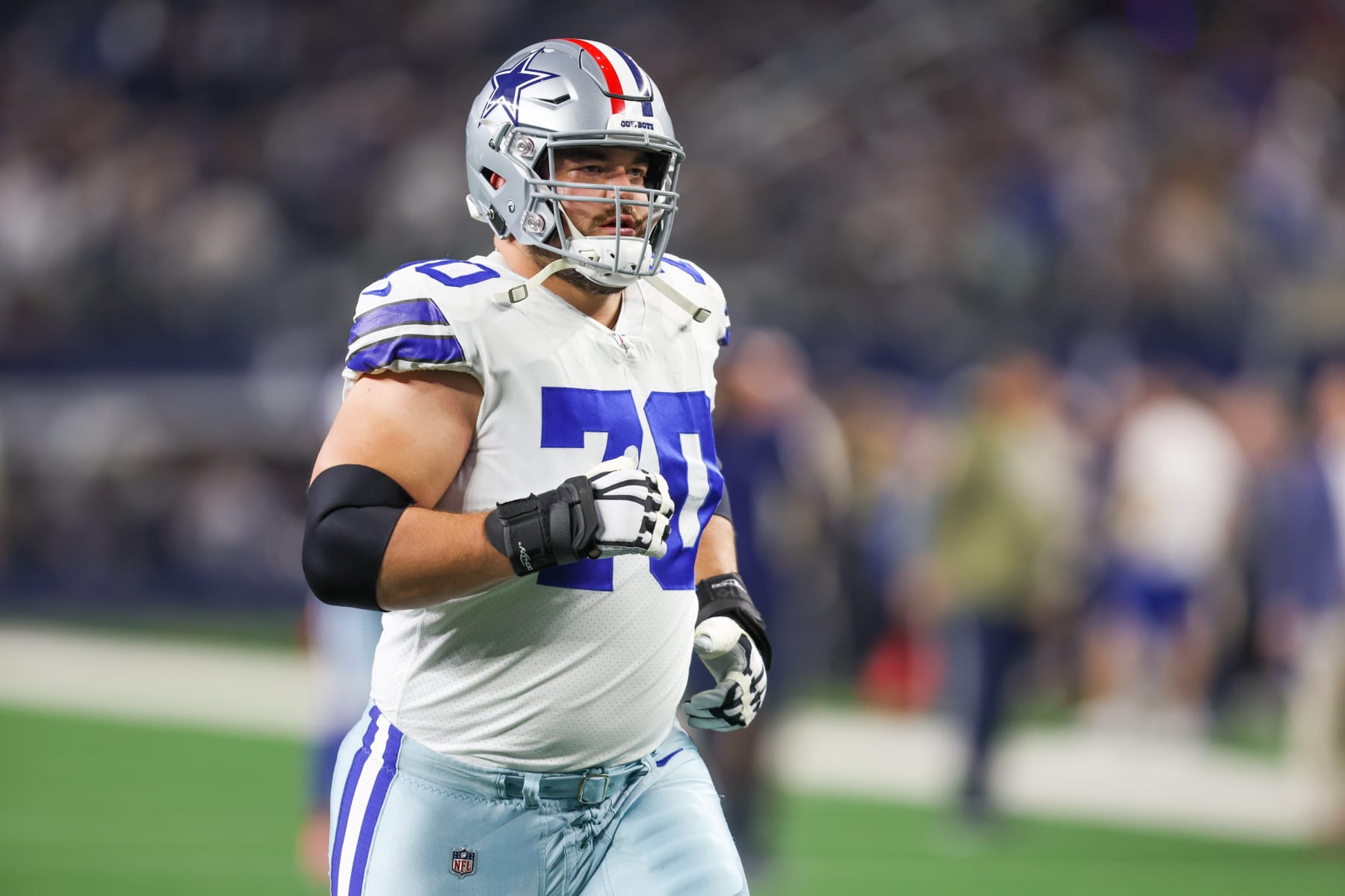 ARLINGTON, TX - DECEMBER 04: Dallas Cowboys guard Zack Martin (70) runs off the field during the game between the Dallas Cowboys and the Indianapolis Colts on December 4, 2022 at AT&T Stadium in Dallas, TX. (Photo by George Walker/Icon Sportswire via Getty Images)
