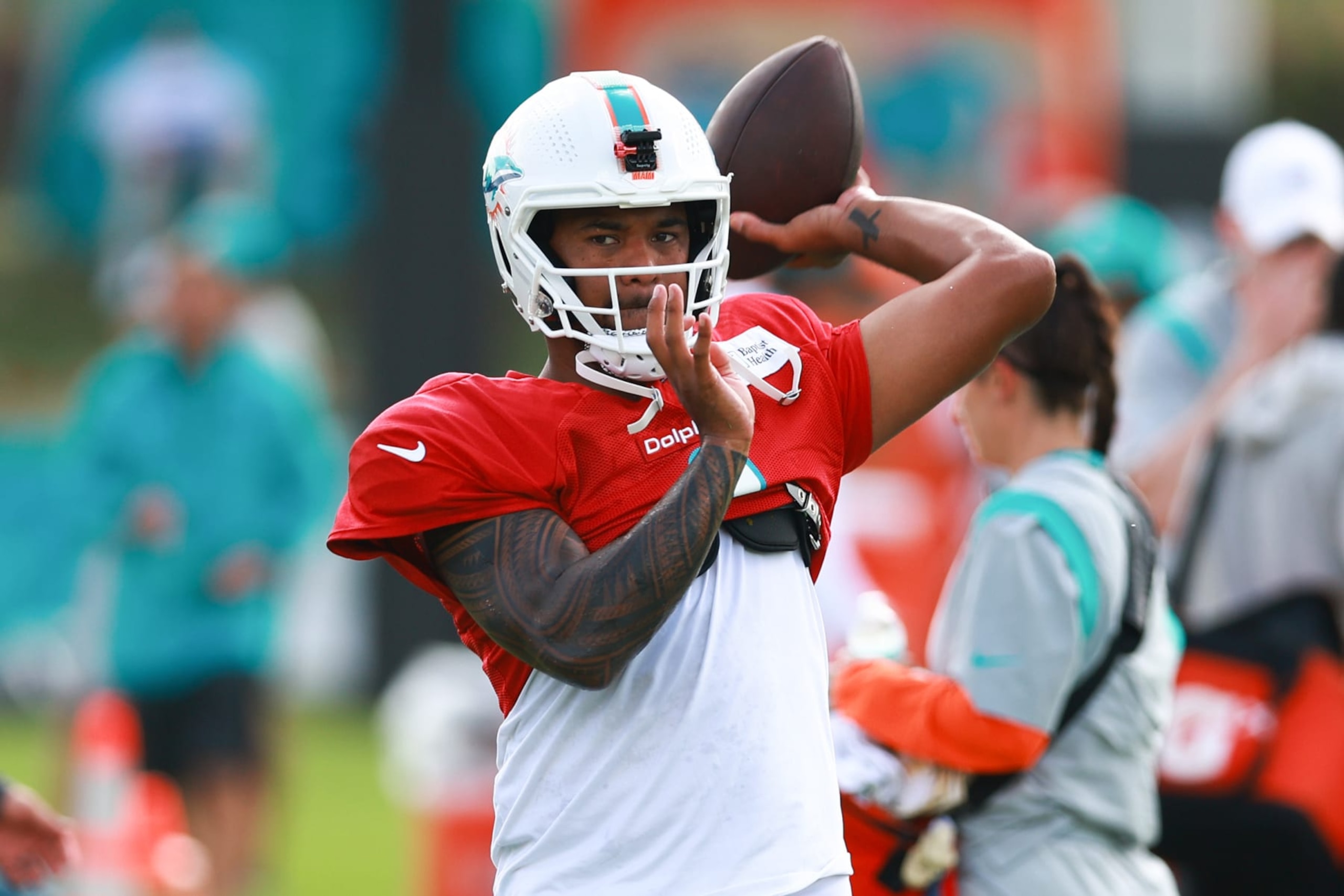 MIAMI GARDENS, FLORIDA - AUGUST 09: Tua Tagovailoa #1 of the Miami Dolphins throws a pass during training camp practice with the Atlanta Falcons at Baptist Health Training Complex on August 09, 2023 in Miami Gardens, Florida. (Photo by Megan Briggs/Getty Images)