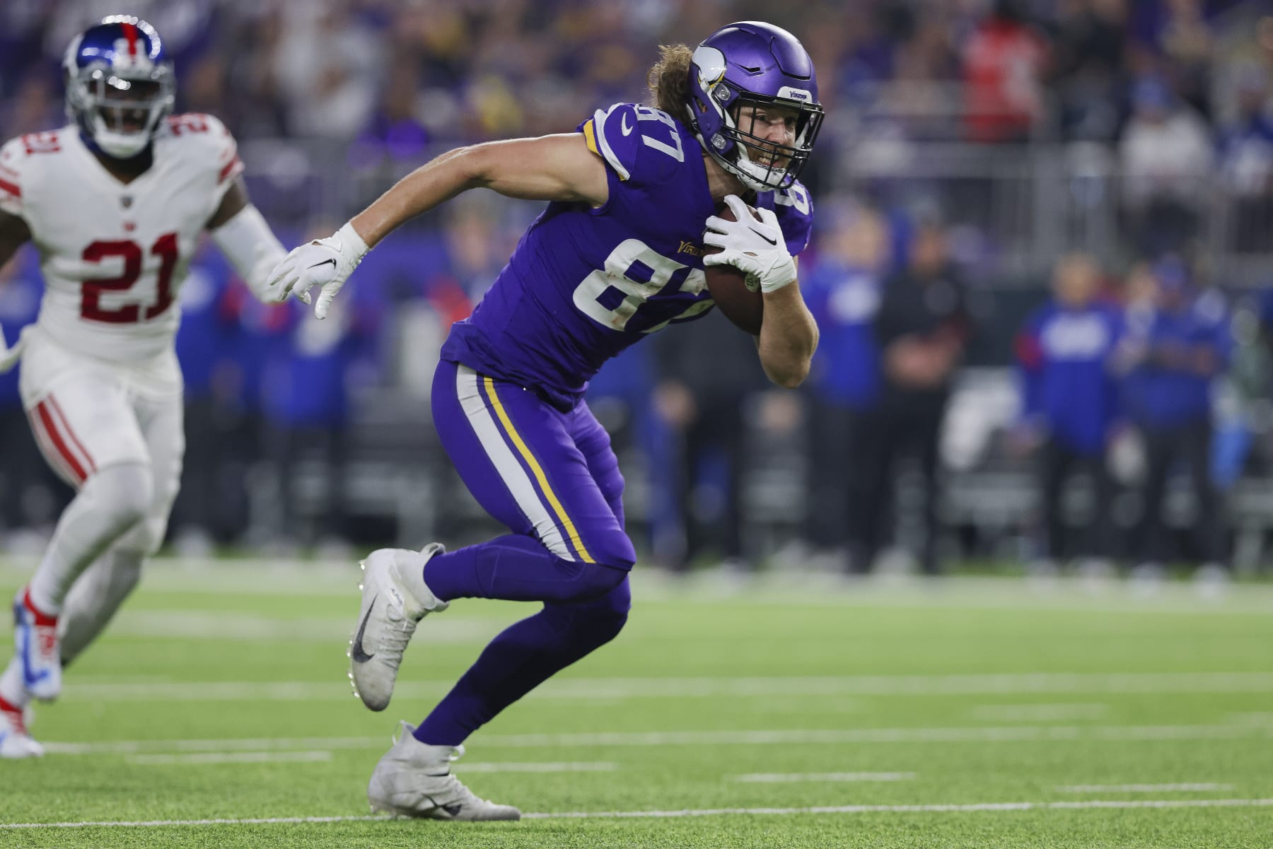 Minnesota Vikings tight end T.J. Hockenson (87) in action during the first half of an NFL wild-card football game against the New York Giants, Sunday, Jan. 15, 2023 in Minneapolis. (AP Photo/Stacy Bengs)