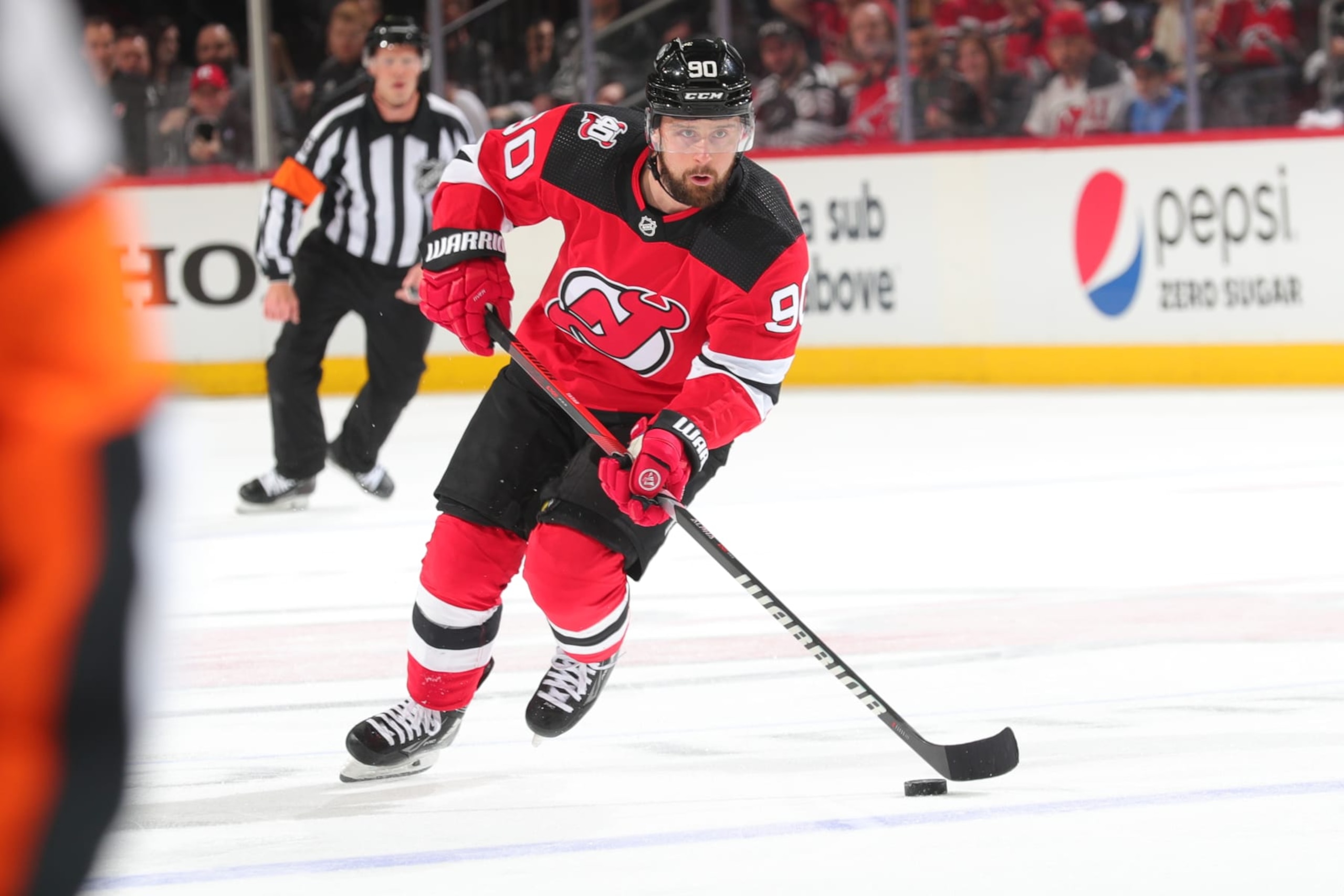 NEWARK, NJ - MAY 01: Tomas Tatar #90 of the New Jersey Devils skates in the first period of Game Three of the Second Round of the 2023 Stanley Cup Playoffs against the Carolina Hurricanes at the Prudential Center on May 7, 2023 in Newark, New Jersey.  (Photo by Rich Graessle/NHLI via Getty Images)
