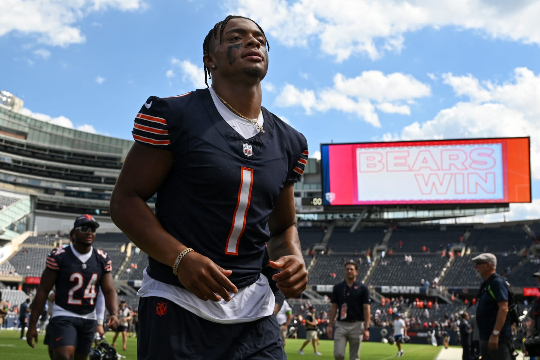 CHICAGO, ILLINOIS - AUGUST 12: Justin Fields #1 of the Chicago Bears leaves the field after the game against the Tennessee Titans during a preseason game at Soldier Field on August 12, 2023 in Chicago, Illinois. (Photo by Quinn Harris/Getty Images)