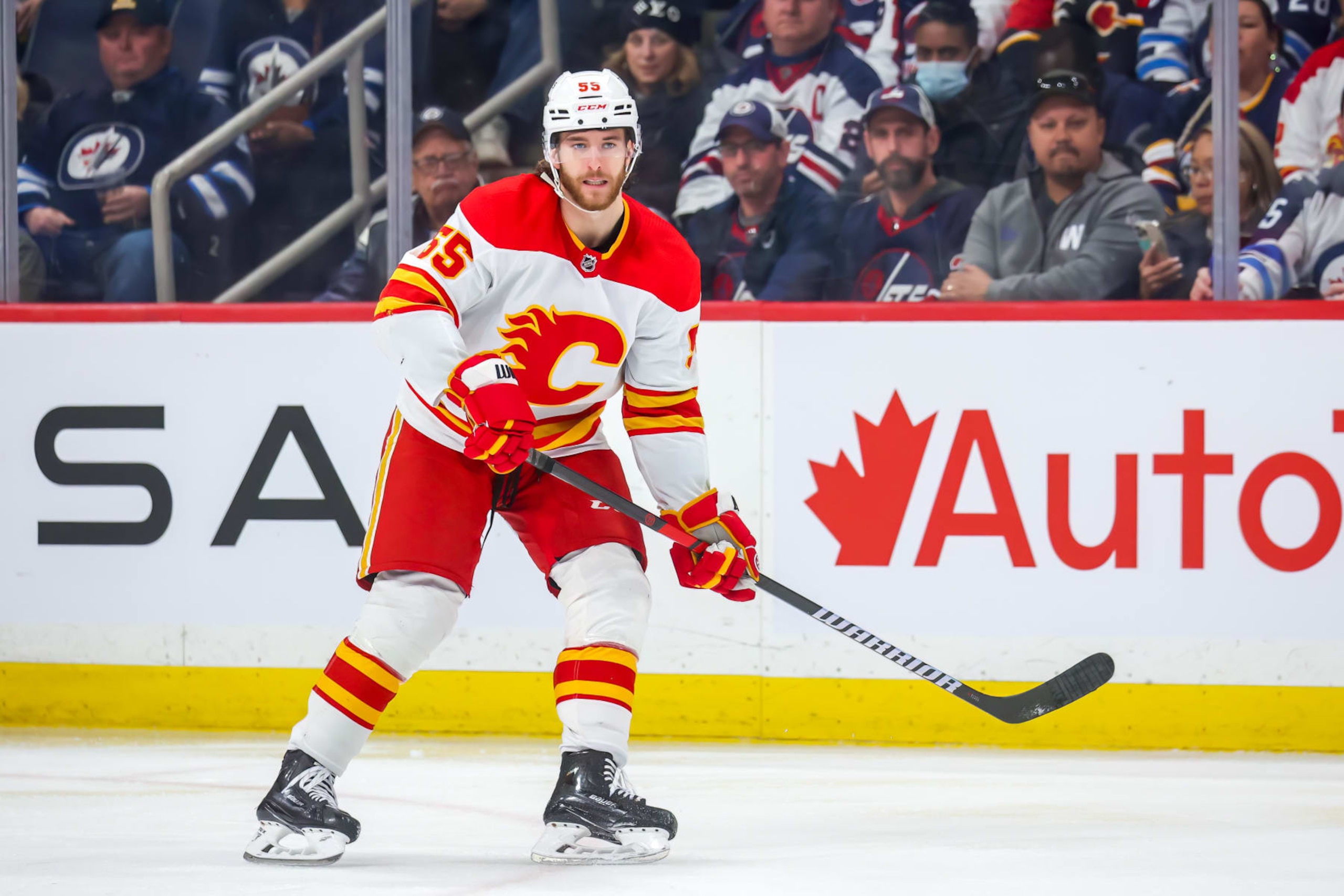 WINNIPEG, CANADA - APRIL 05: Noah Hanifin #55 of the Calgary Flames skates during third period action against the Winnipeg Jets at Canada Life Centre on April 05, 2023 in Winnipeg, Manitoba, Canada. (Photo by Jonathan Kozub/NHLI via Getty Images)