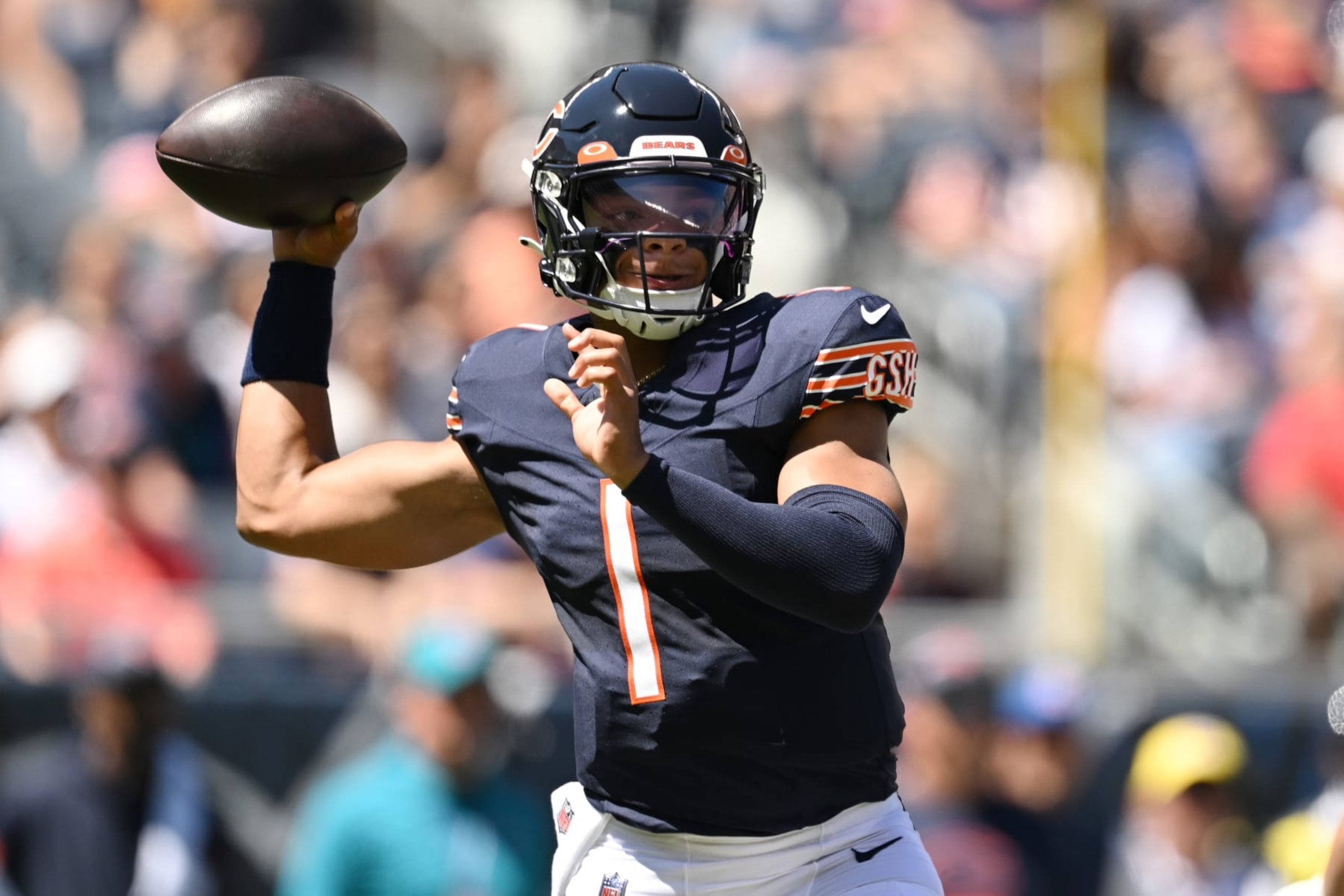 CHICAGO, ILLINOIS - AUGUST 12: Justin Fields #1 of the Chicago Bears passes in the first quarter against the Tennessee Titans during a preseason game at Soldier Field on August 12, 2023 in Chicago, Illinois. (Photo by Quinn Harris/Getty Images)