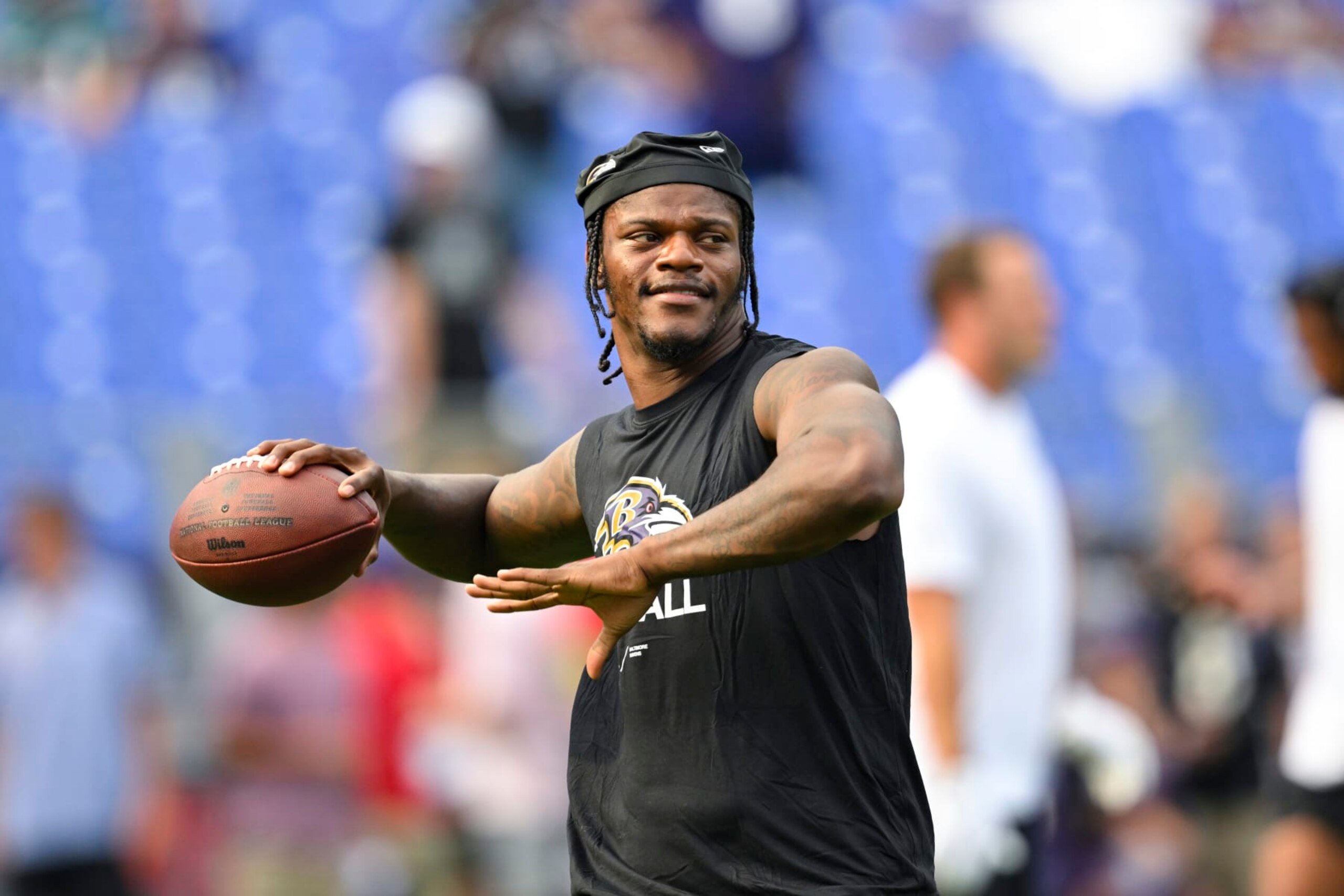 Baltimore Ravens quarterback Lamar Jackson throws during pre-game warm-ups before an NFL preseason football game against the Philadelphia Eagles, Saturday, Aug. 12, 2022, in Baltimore. (AP Photo/Terrance Williams)