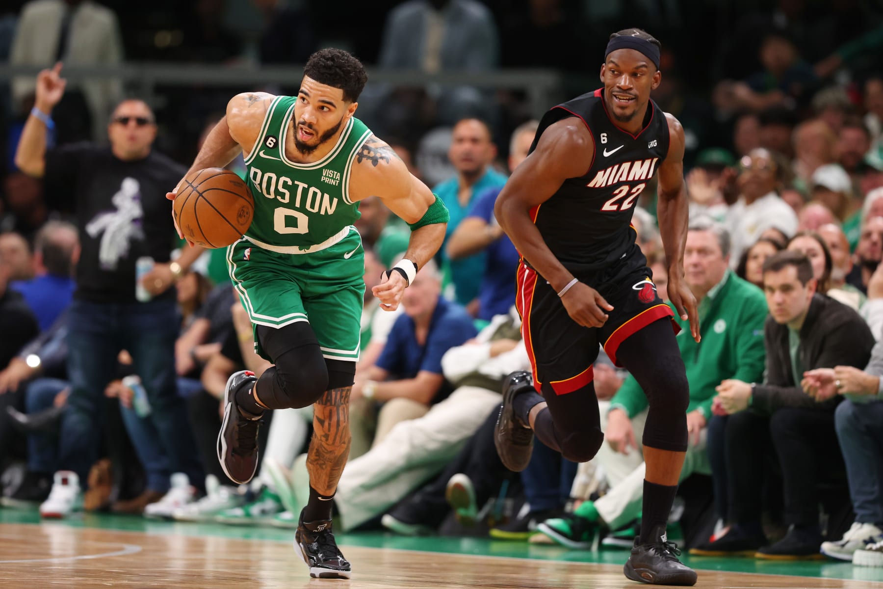 BOSTON, MASSACHUSETTS - MAY 29: Jayson Tatum #0 of the Boston Celtics dribbles against Jimmy Butler #22 of the Miami Heat during the second quarter in game seven of the Eastern Conference Finals at TD Garden on May 29, 2023 in Boston, Massachusetts. NOTE TO USER: User expressly acknowledges and agrees that, by downloading and or using this photograph, User is consenting to the terms and conditions of the Getty Images License Agreement. (Photo by Maddie Meyer/Getty Images)