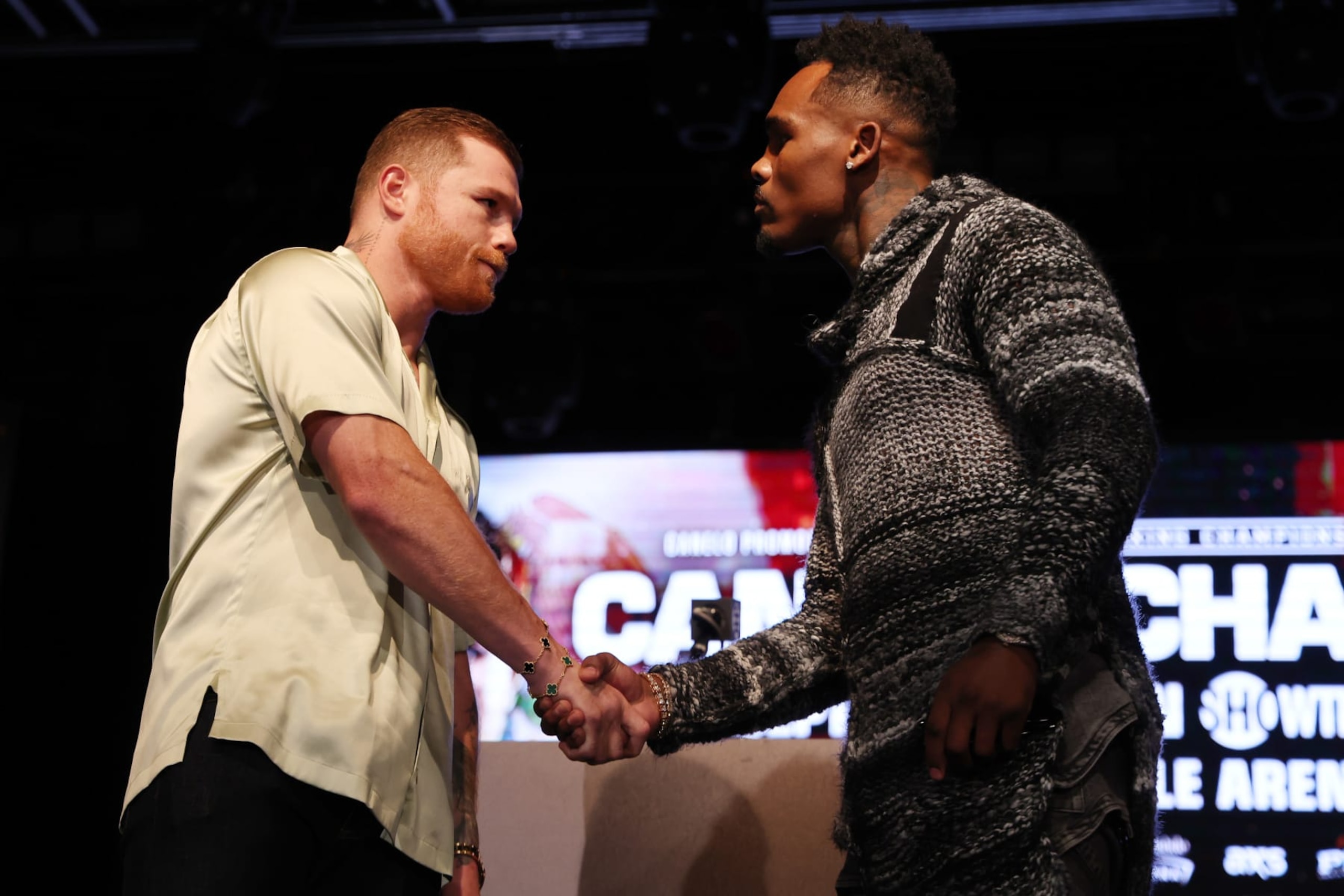 NEW YORK, NEW YORK - AUGUST 15: Canelo Alvarez of Mexico (L) and Jermell Charlo (R) face off during a press conference to preview their September 30 super middleweight undisputed championship fight at Palladium Times Square on August 15, 2023 in New York City. (Photo by Sarah Stier/Getty Images)