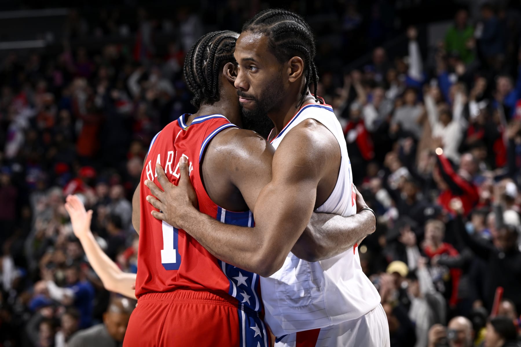 PHILADELPHIA, PA - DECEMBER 23: Kawhi Leonard #2 of the LA Clippers embraces James Harden #1 of the Philadelphia 76ers after the game on December 23, 2022 at the Wells Fargo Center in Philadelphia, Pennsylvania NOTE TO USER: User expressly acknowledges and agrees that, by downloading and/or using this Photograph, user is consenting to the terms and conditions of the Getty Images License Agreement. Mandatory Copyright Notice: Copyright 2022 NBAE (Photo by David Dow/NBAE via Getty Images)