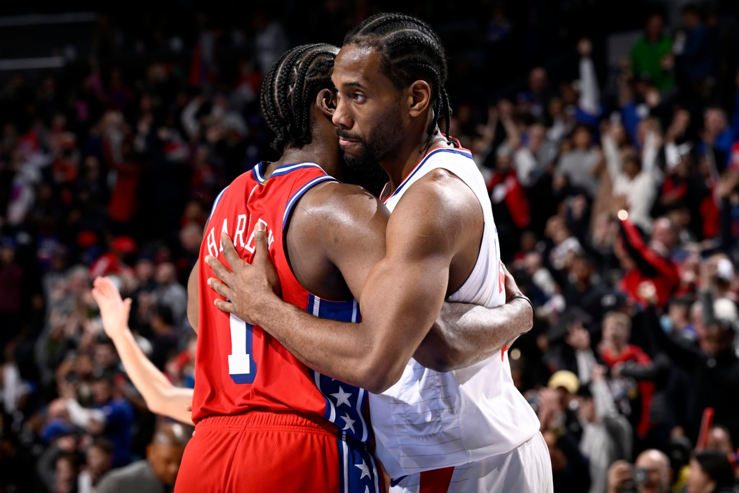 PHILADELPHIA, PA - DECEMBER 23: Kawhi Leonard #2 of the LA Clippers embraces James Harden #1 of the Philadelphia 76ers after the game on December 23, 2022 at the Wells Fargo Center in Philadelphia, Pennsylvania NOTE TO USER: User expressly acknowledges and agrees that, by downloading and/or using this Photograph, user is consenting to the terms and conditions of the Getty Images License Agreement. Mandatory Copyright Notice: Copyright 2022 NBAE (Photo by David Dow/NBAE via Getty Images)