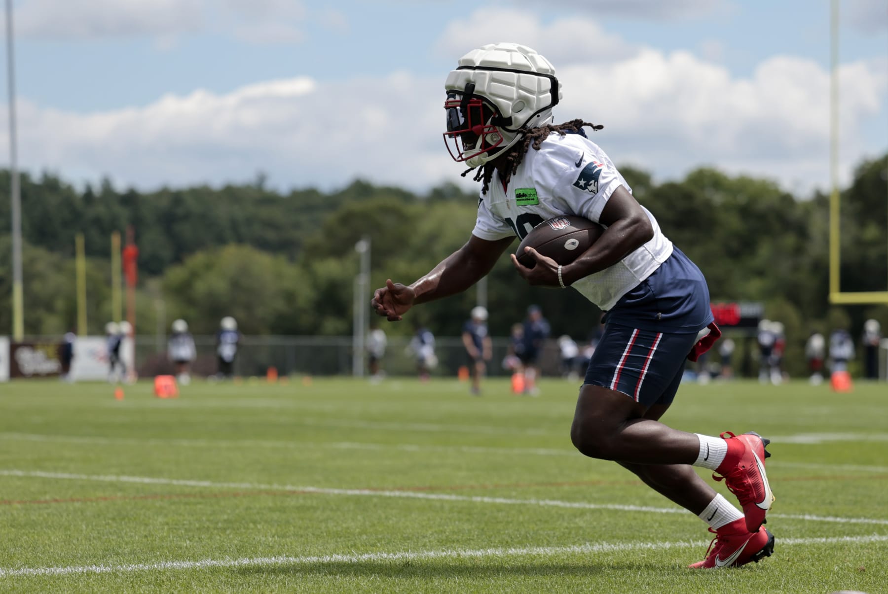 FOXBOROUGH, MA - JULY 30: New England Patriots running back Rhamondre Stevenson (38) carries the ball during New England Patriots Training Camp on July 30, 2023, at the Patriots Practice Facility at Gillette Stadium in Foxborough, Massachusetts. (Photo by Fred Kfoury III/Icon Sportswire via Getty Images)