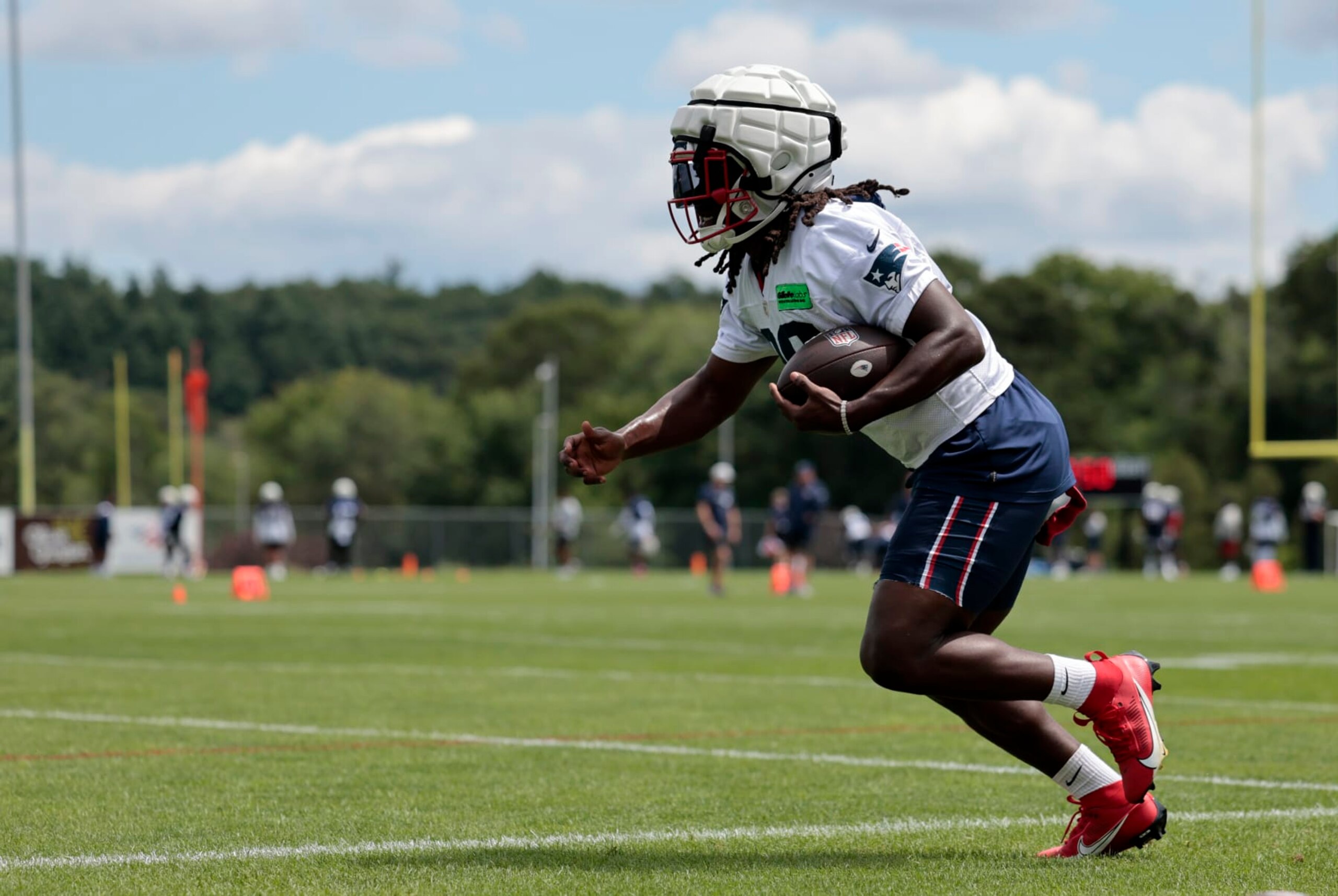 FOXBOROUGH, MA - JULY 30: New England Patriots running back Rhamondre Stevenson (38) carries the ball during New England Patriots Training Camp on July 30, 2023, at the Patriots Practice Facility at Gillette Stadium in Foxborough, Massachusetts. (Photo by Fred Kfoury III/Icon Sportswire via Getty Images)